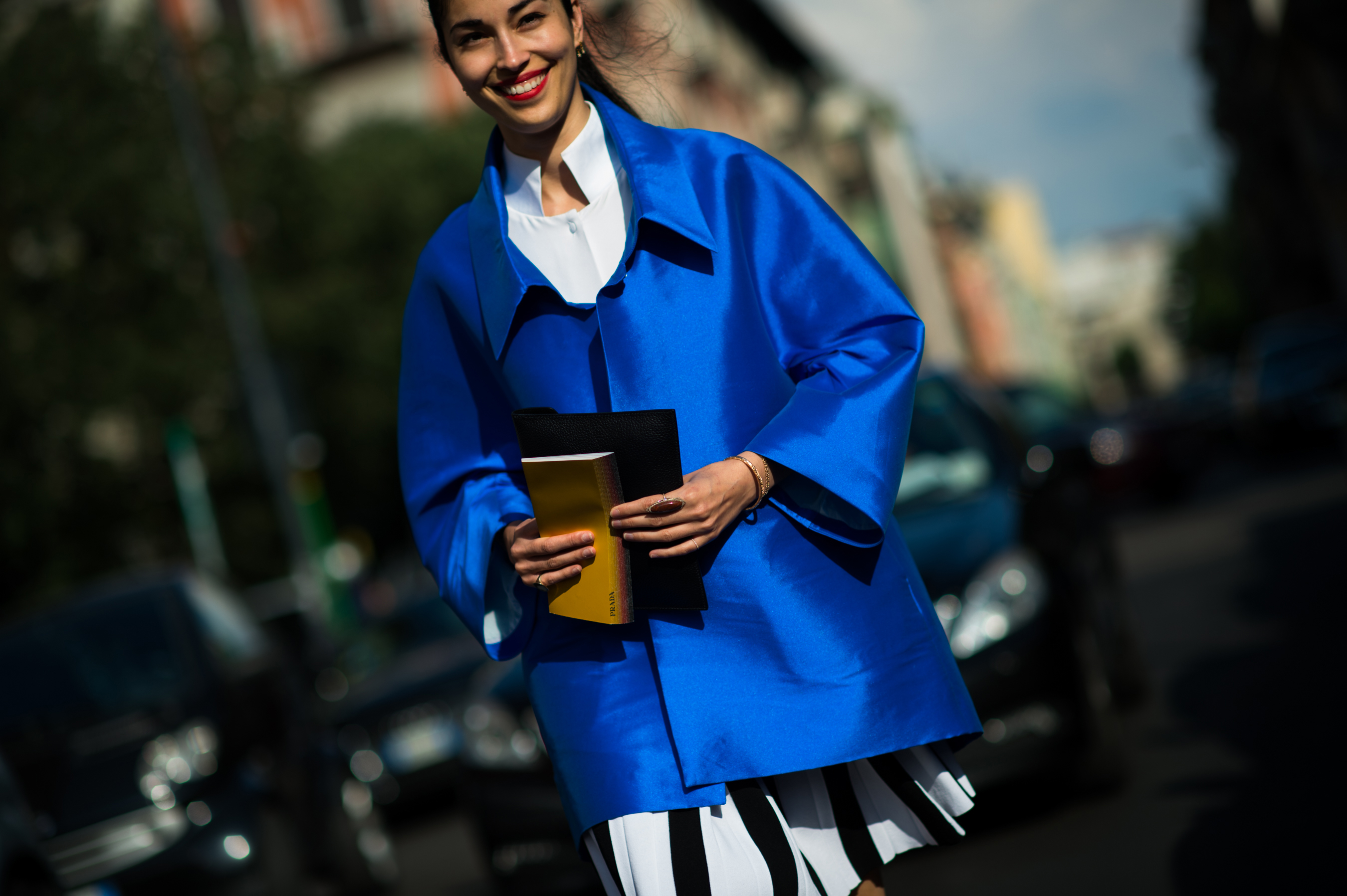 Editor wearing blue shiny jacket