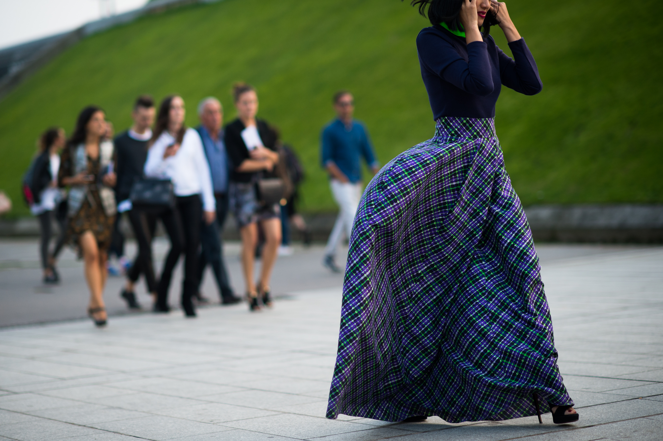 Asian woman skirt blowing in wind