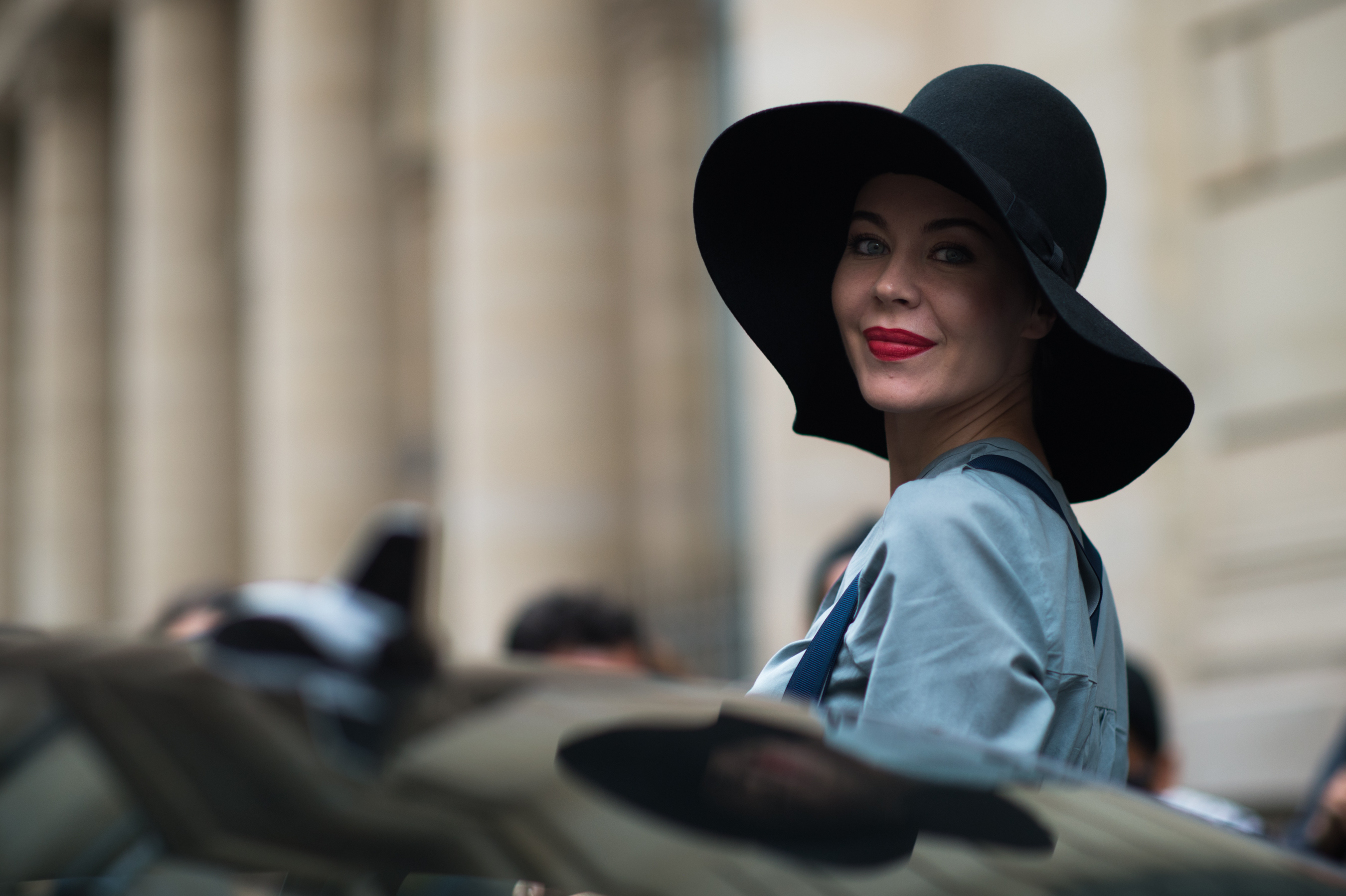 Russian woman wearing hat and red lips
