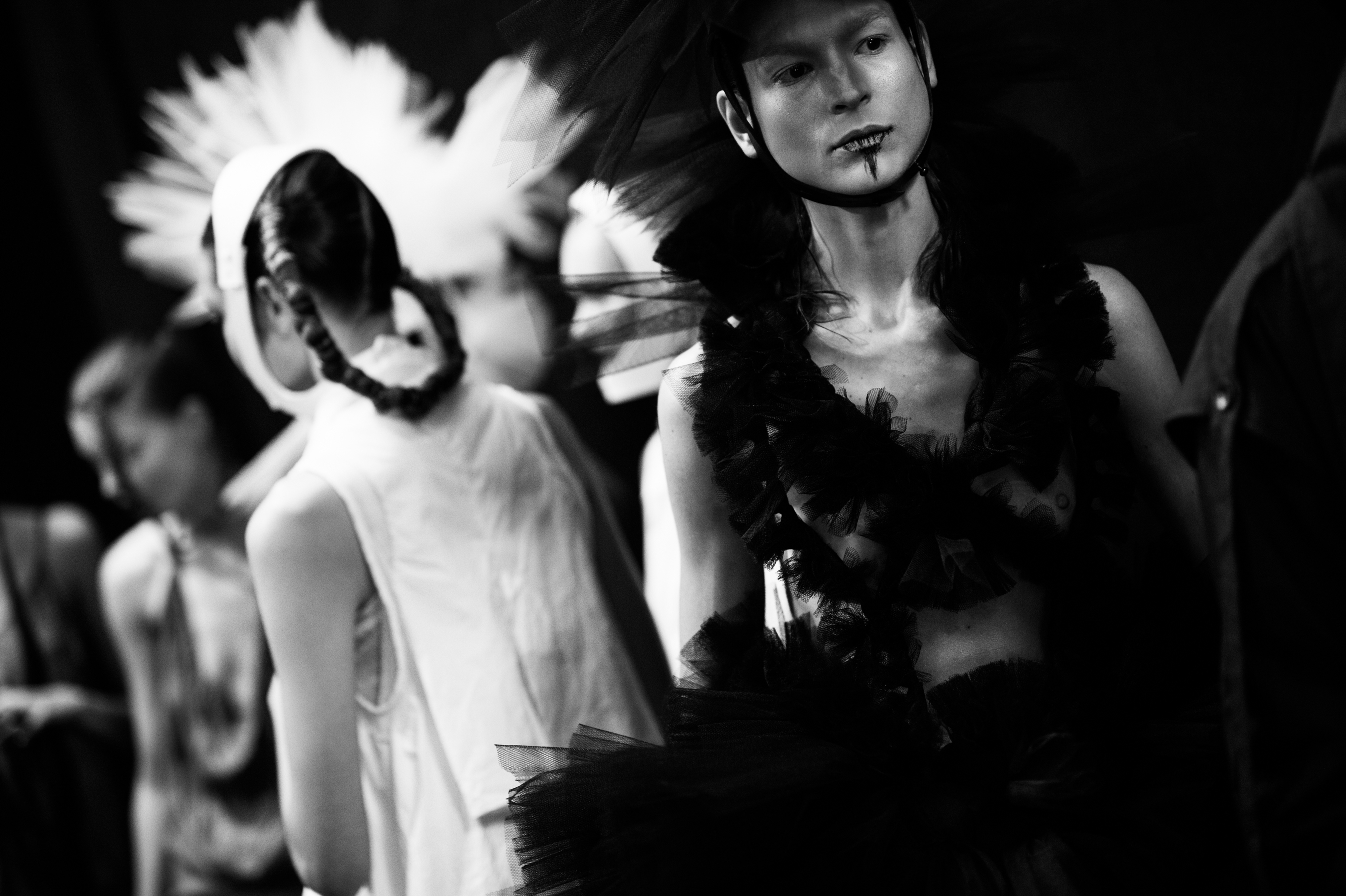Models wearing black and white