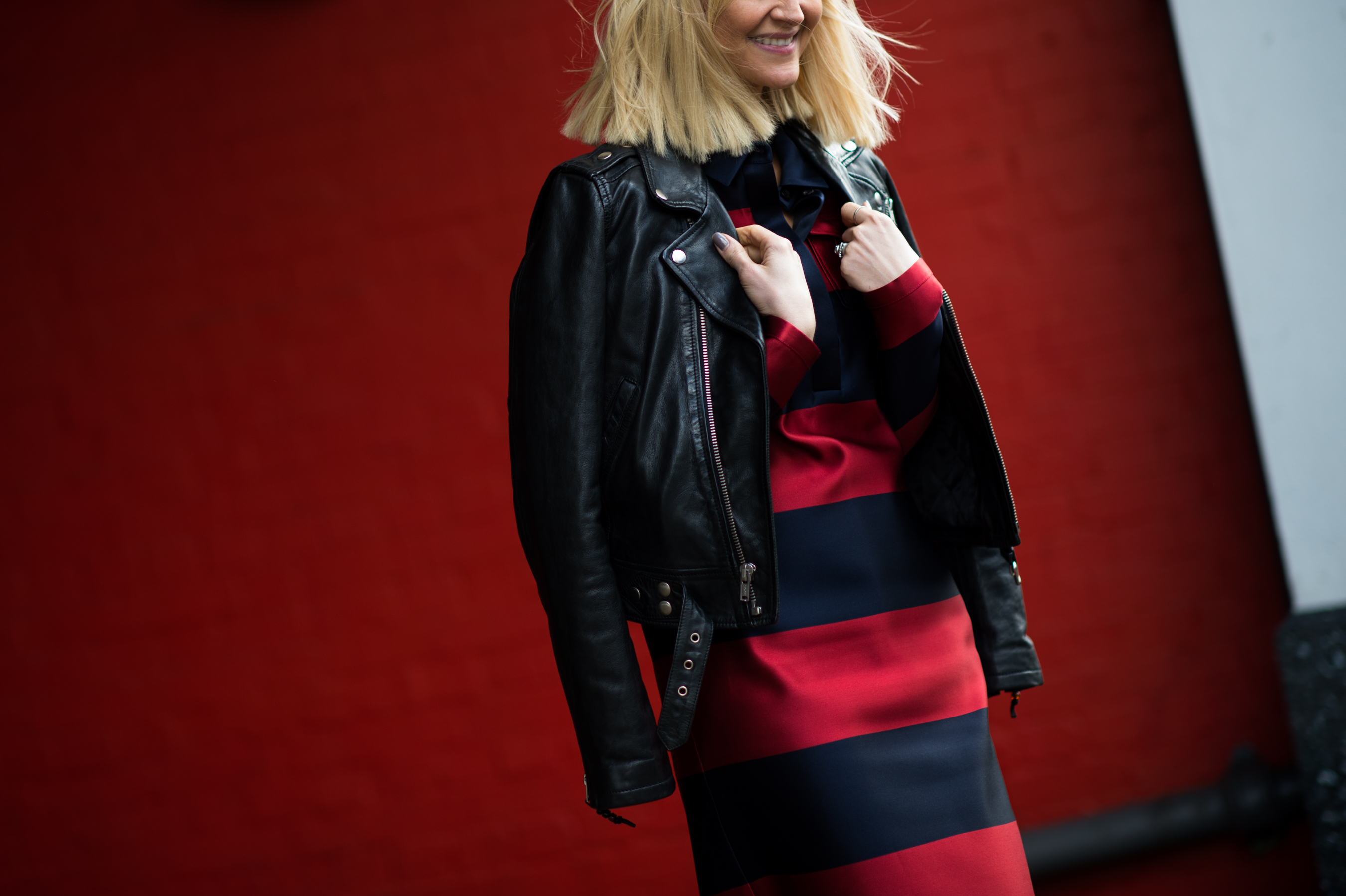 Blonde woman wearing red stripes
