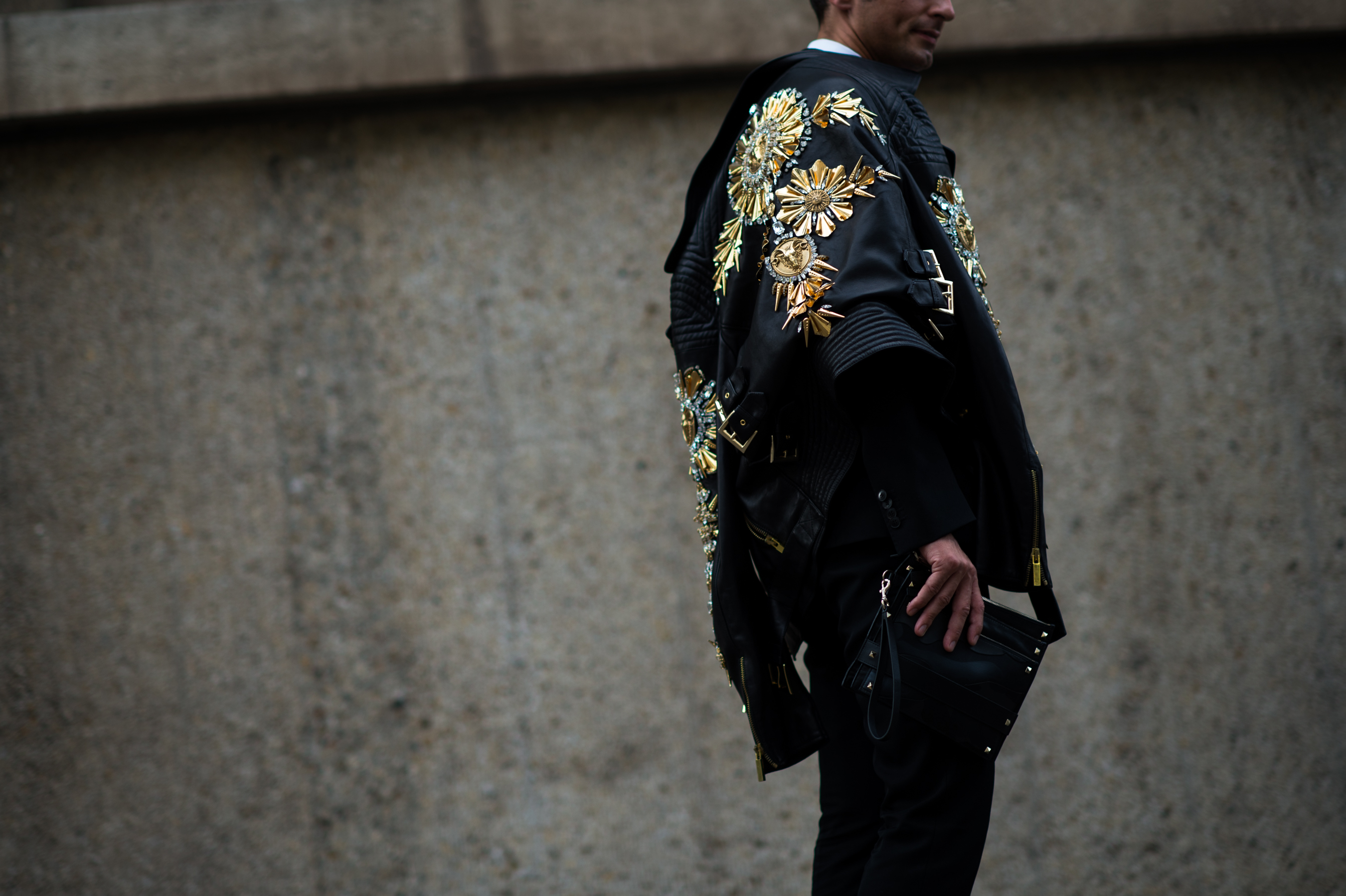 Italian man wearing jewel encrusted leather jacket