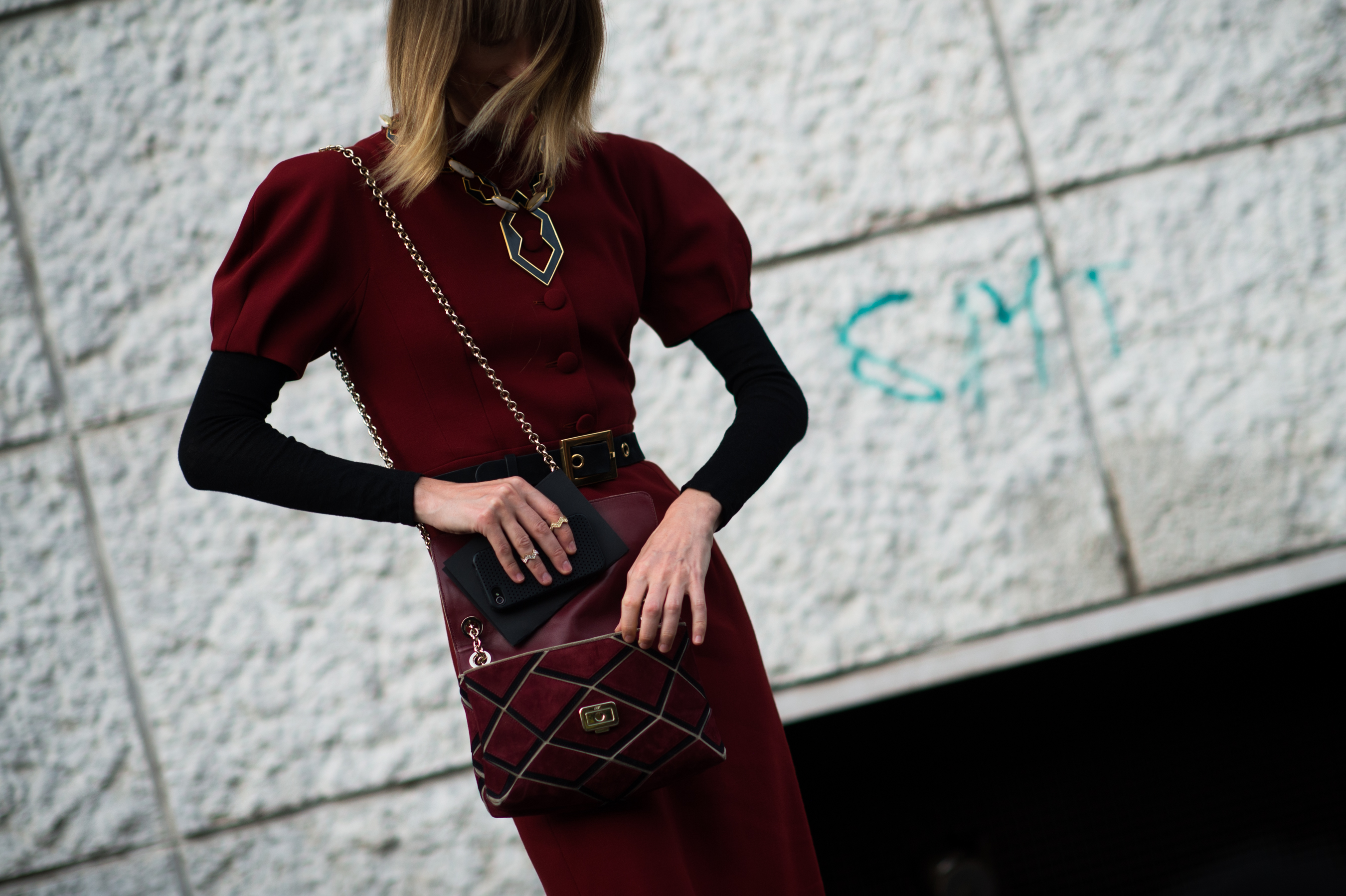 Russian editor wearing maroon dress