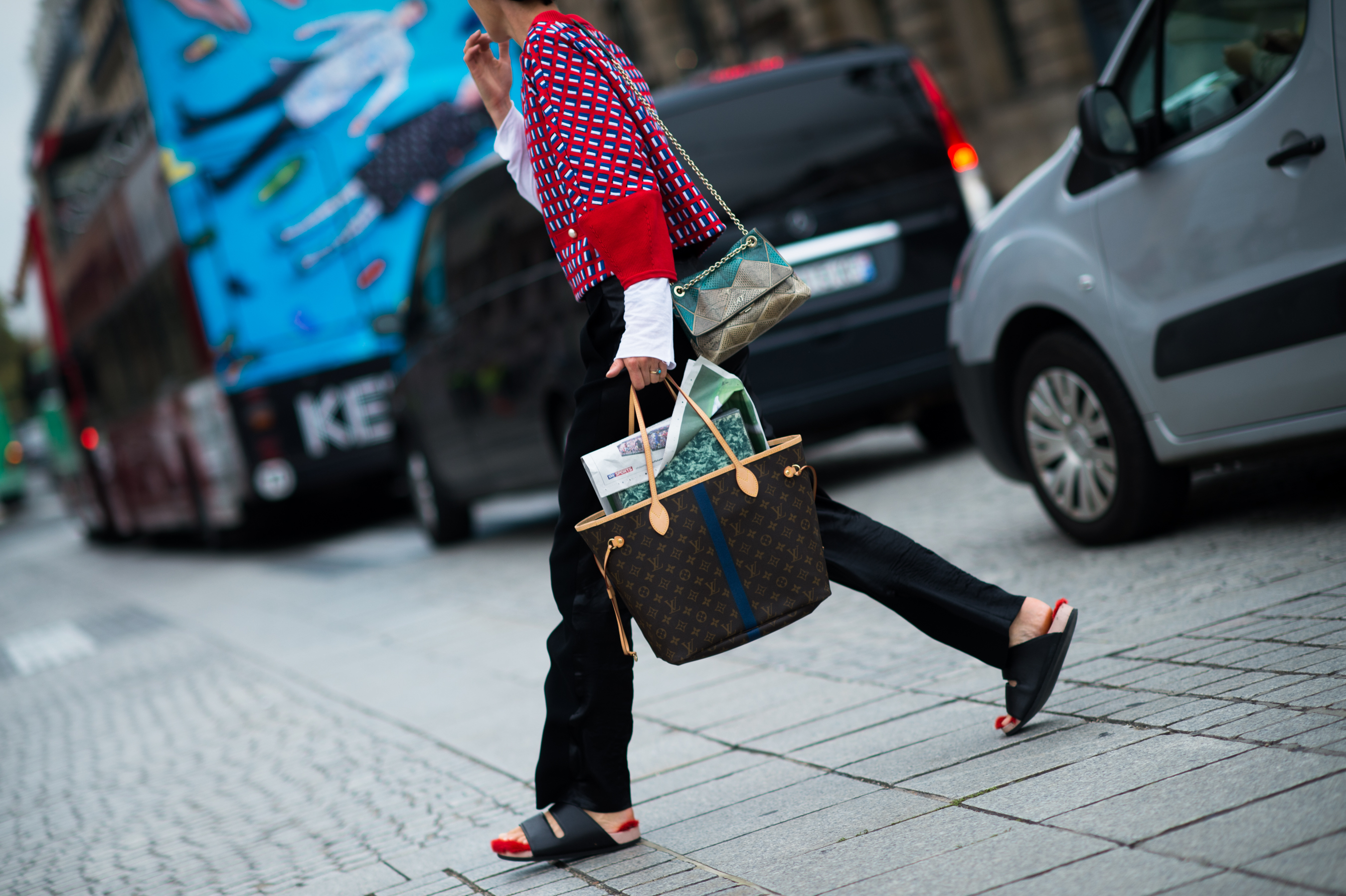 Model wearing red fur Céline sandals