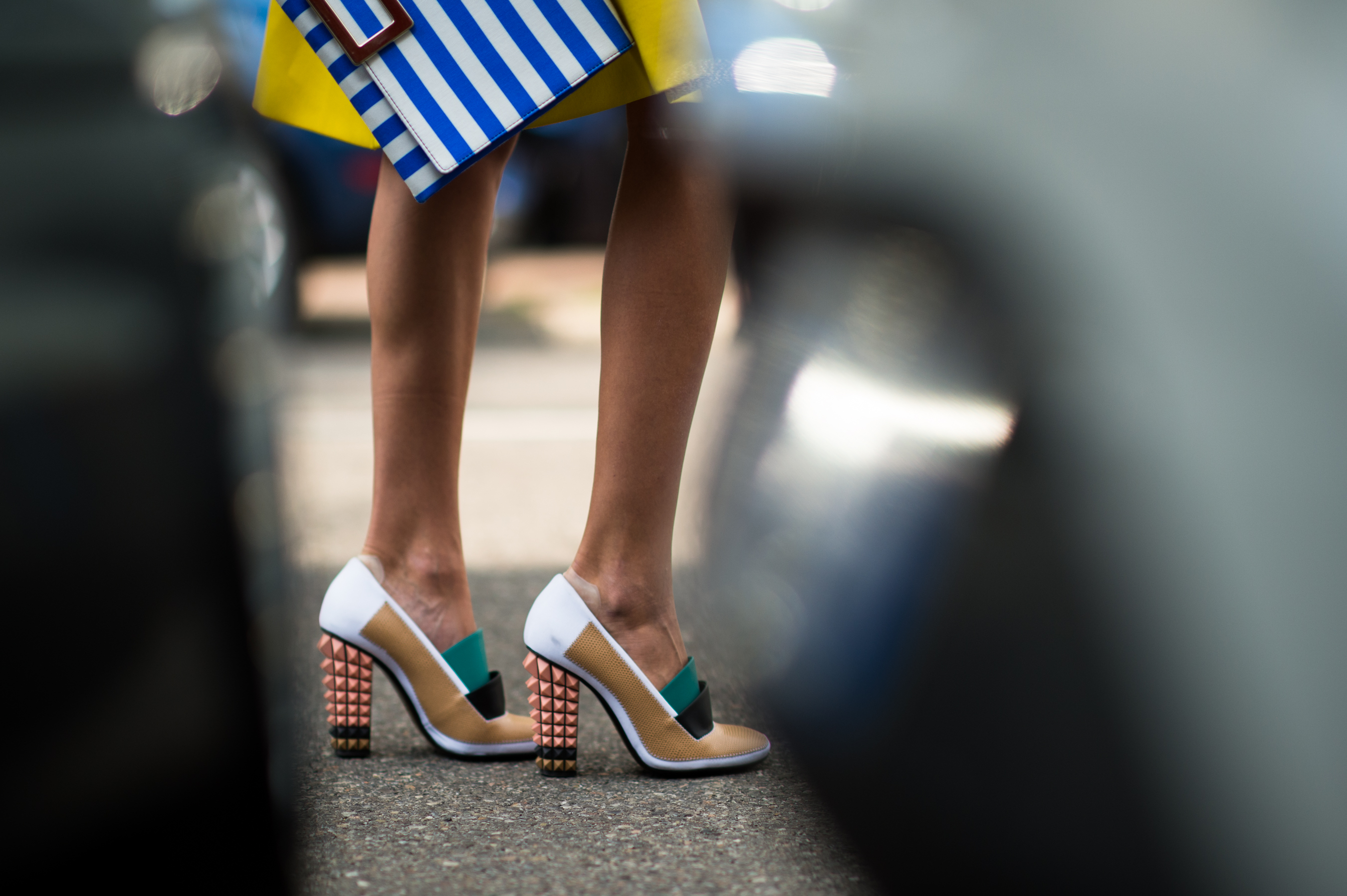 Italian woman wearing studded Fendi heels