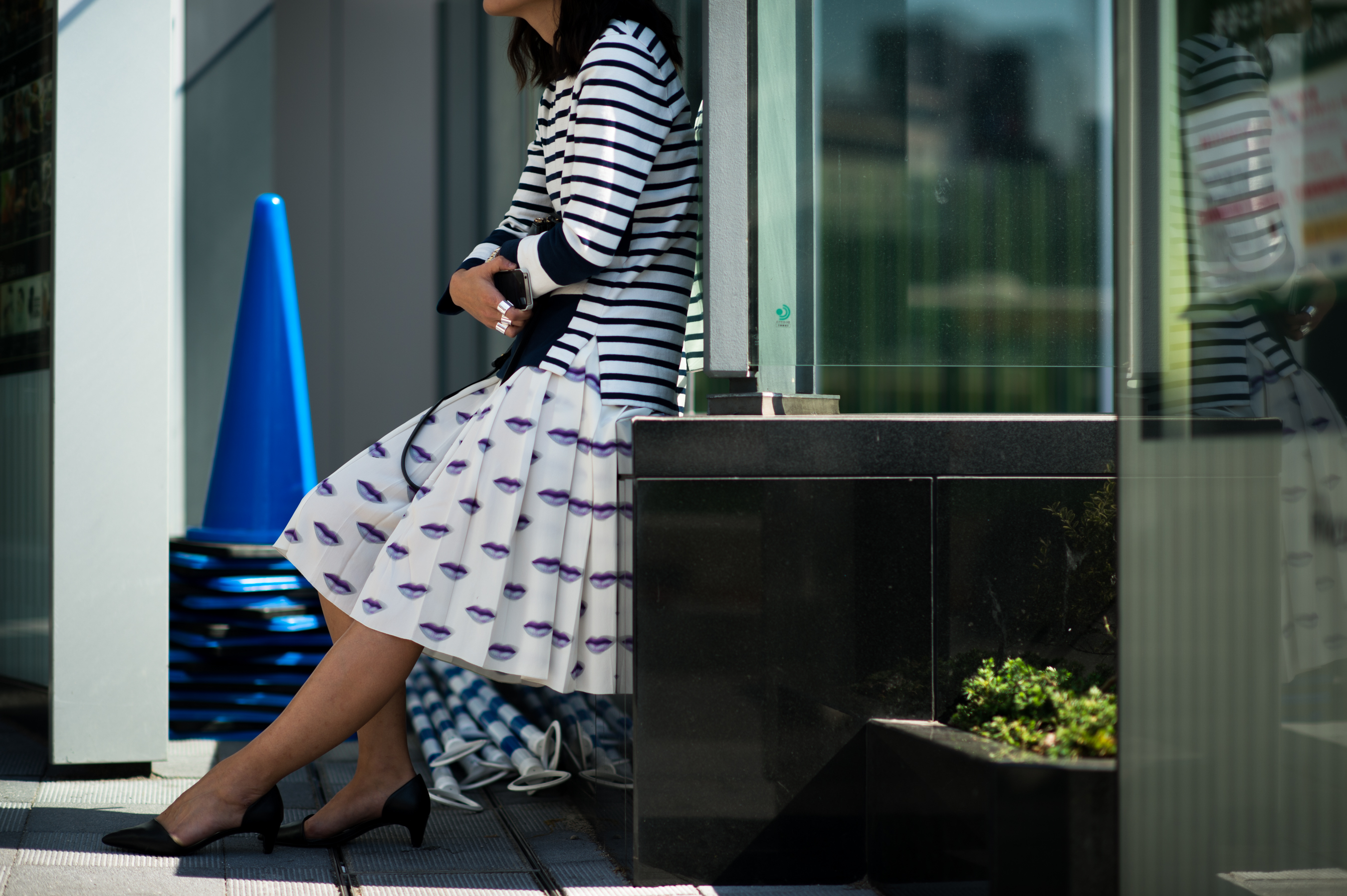 Woman wearing lips print skirt