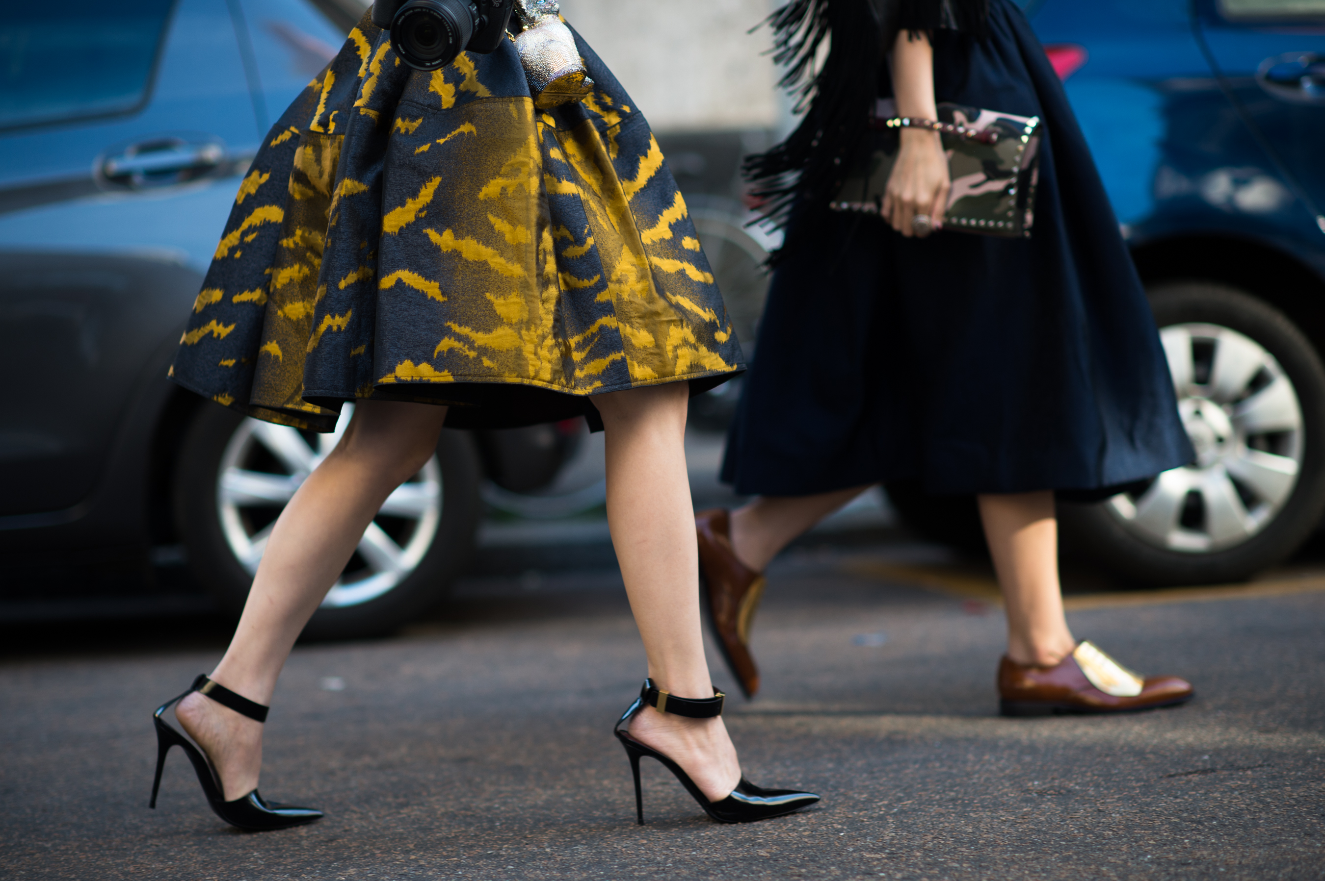 Two women wearing skirts in Italy