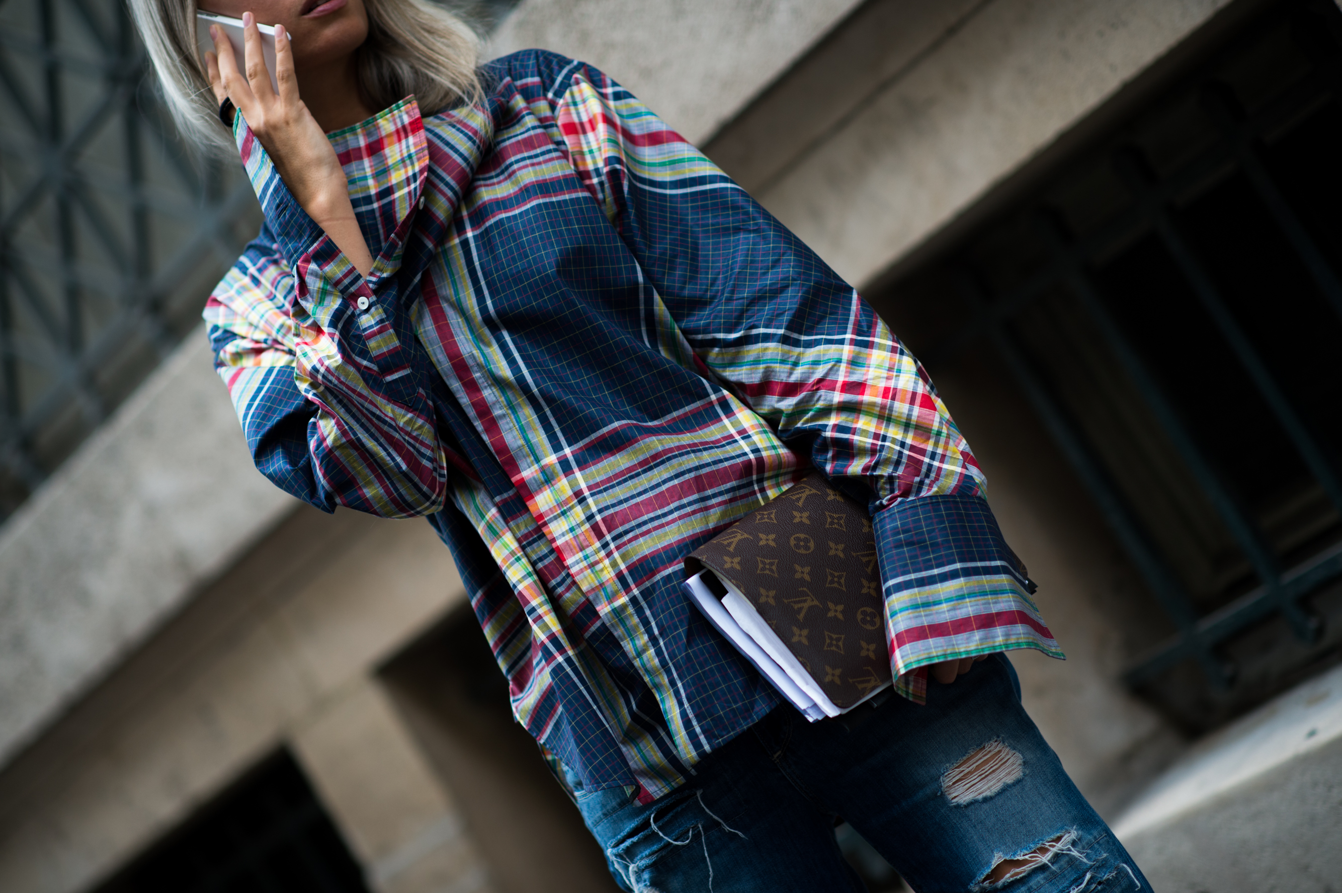 British Vogue editor wearing plaid shirt