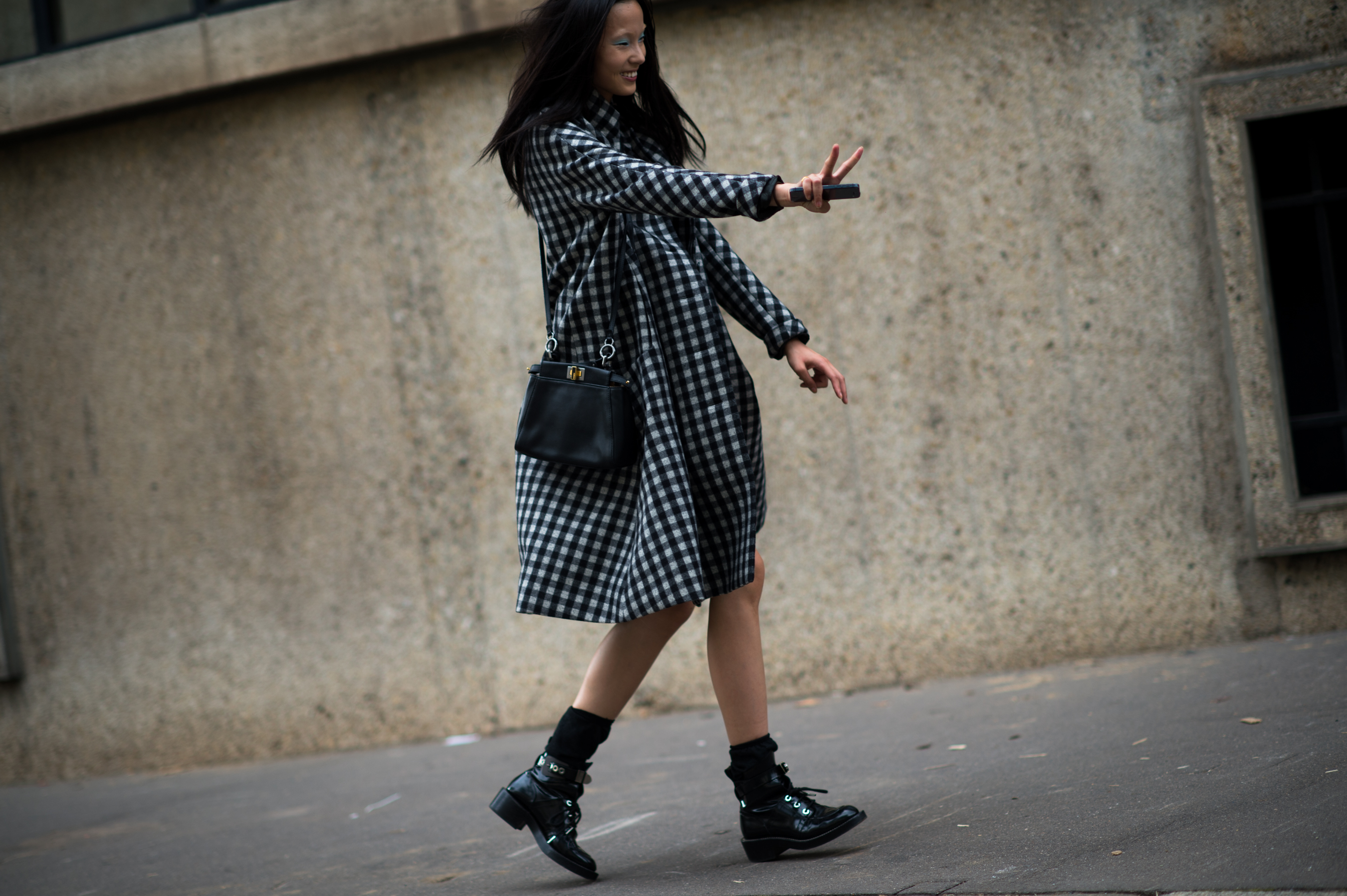 Chinese Model wearing checker coat