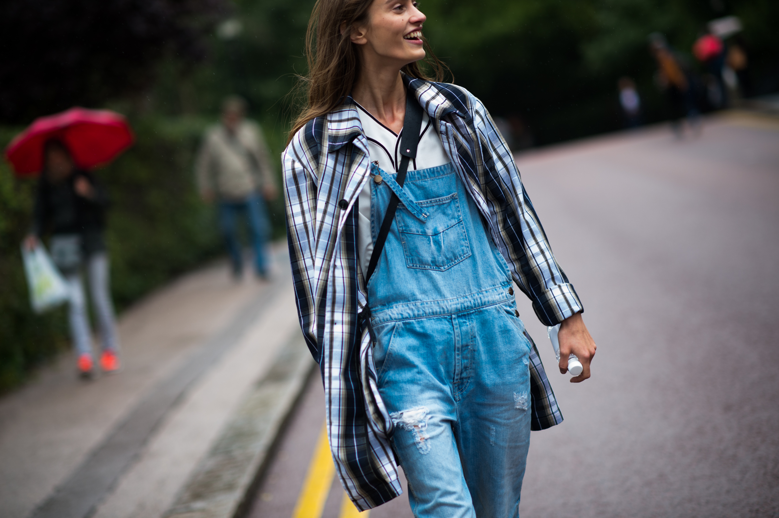 French model wearing denim overalls