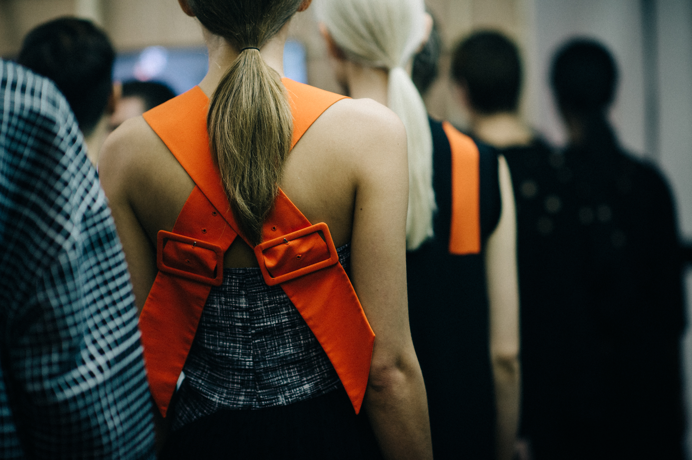 Model with cross-back dress