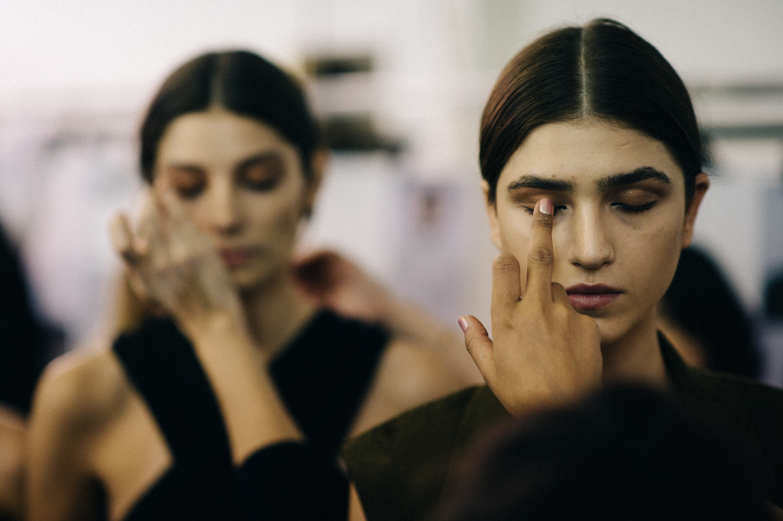 Two models in hair and makeup