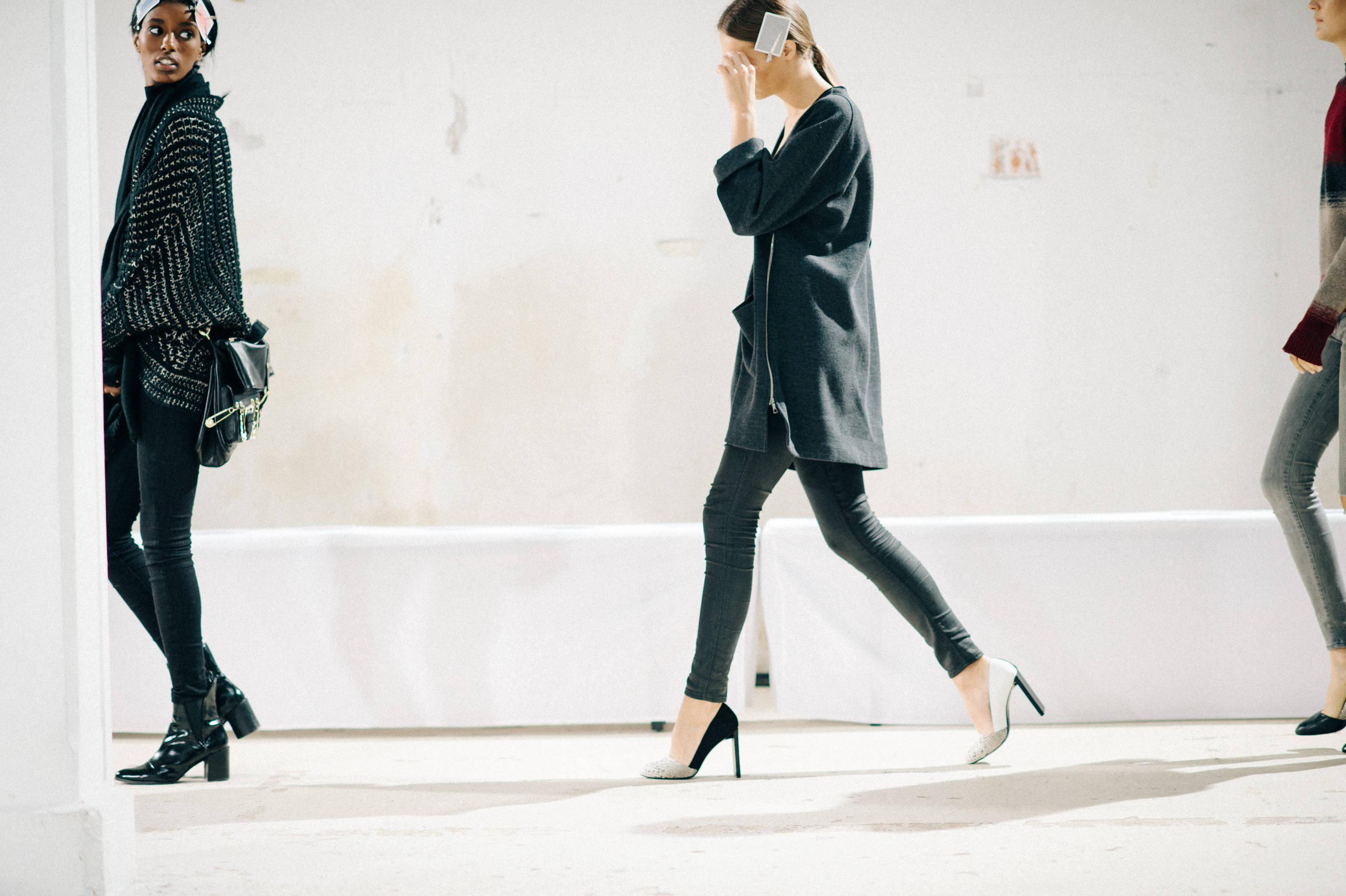 Models walking runway rehearsal in heels