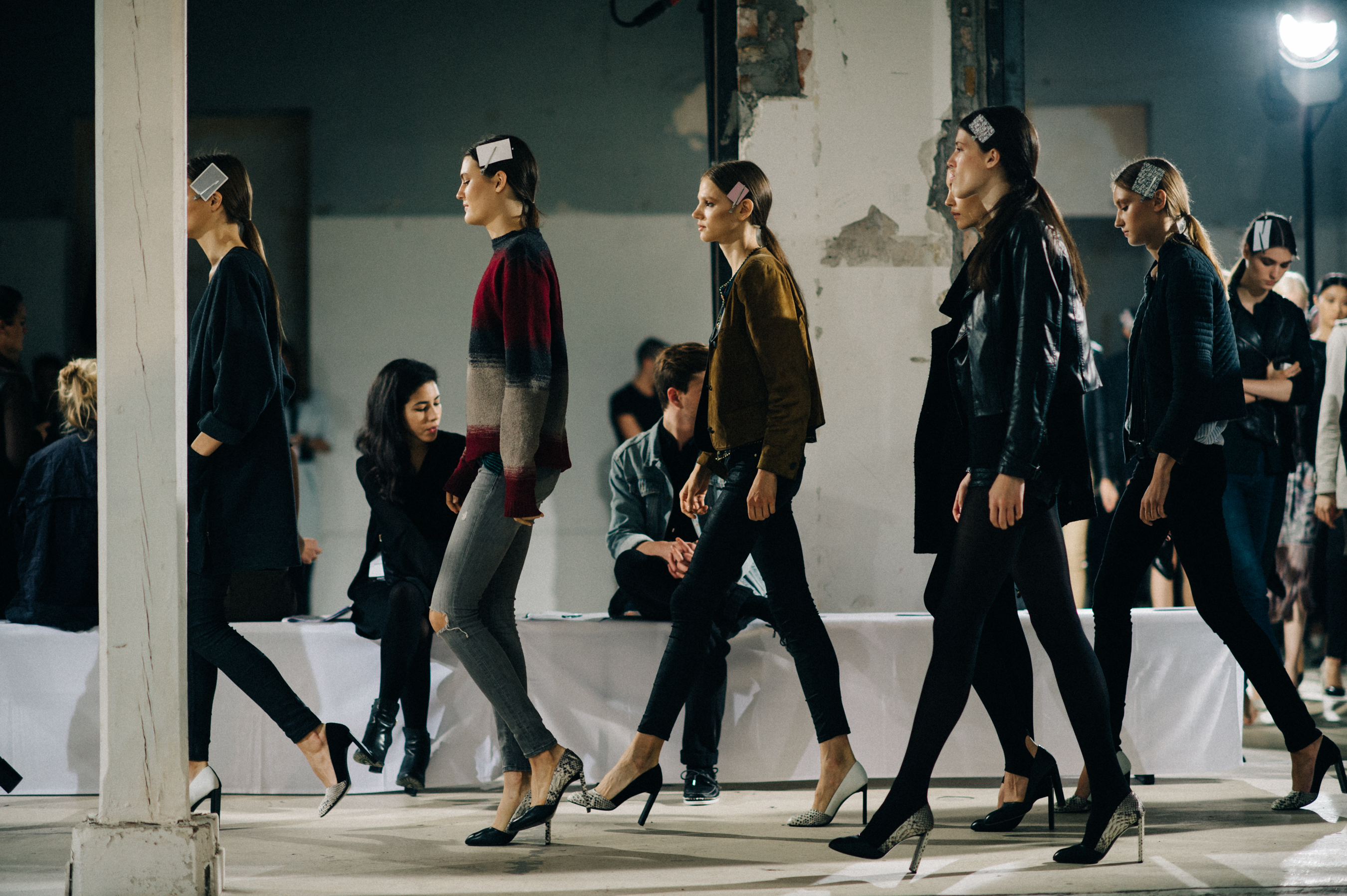 Models walking runway rehearsal show