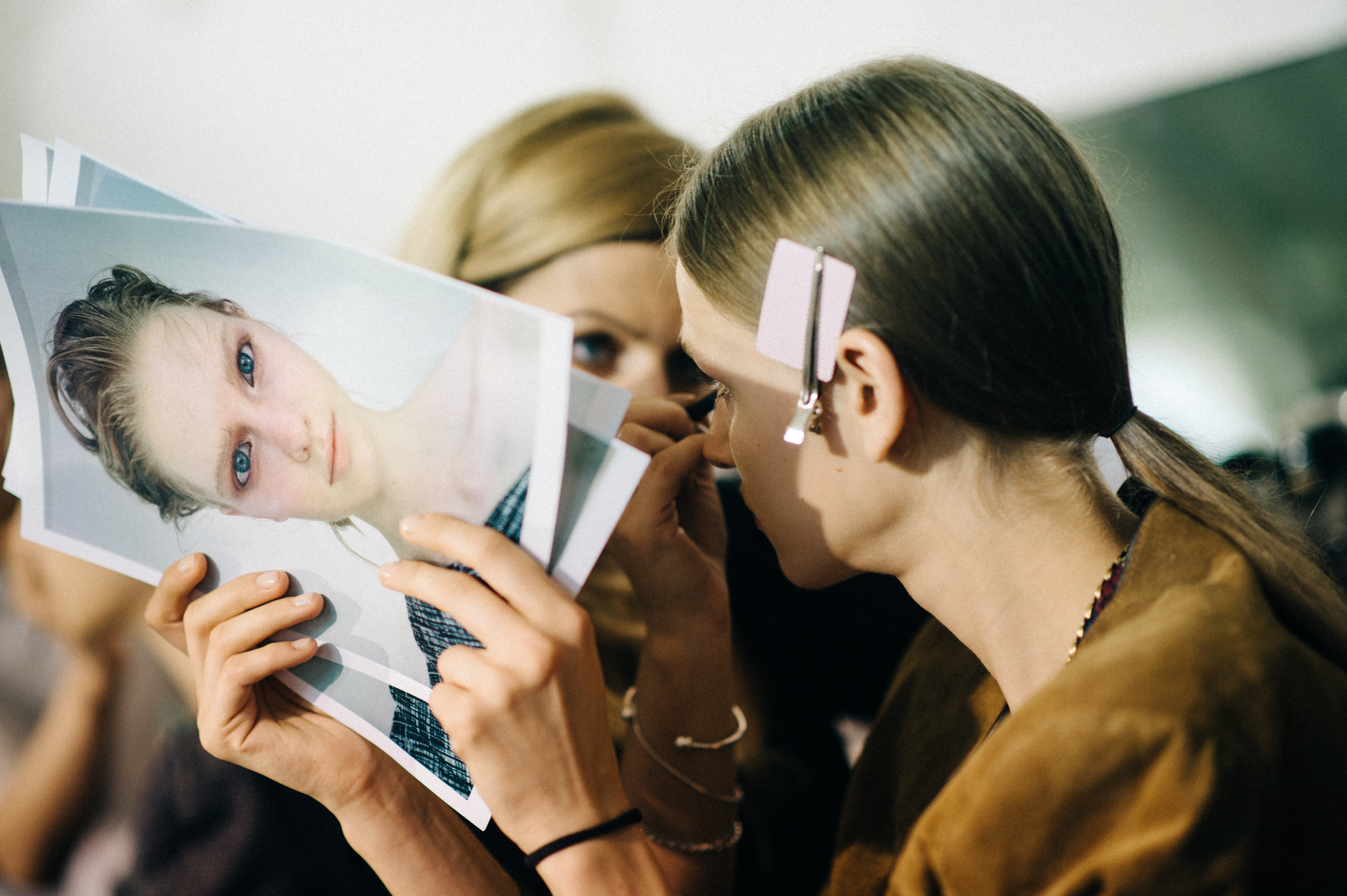 Model in hair and makeup before show