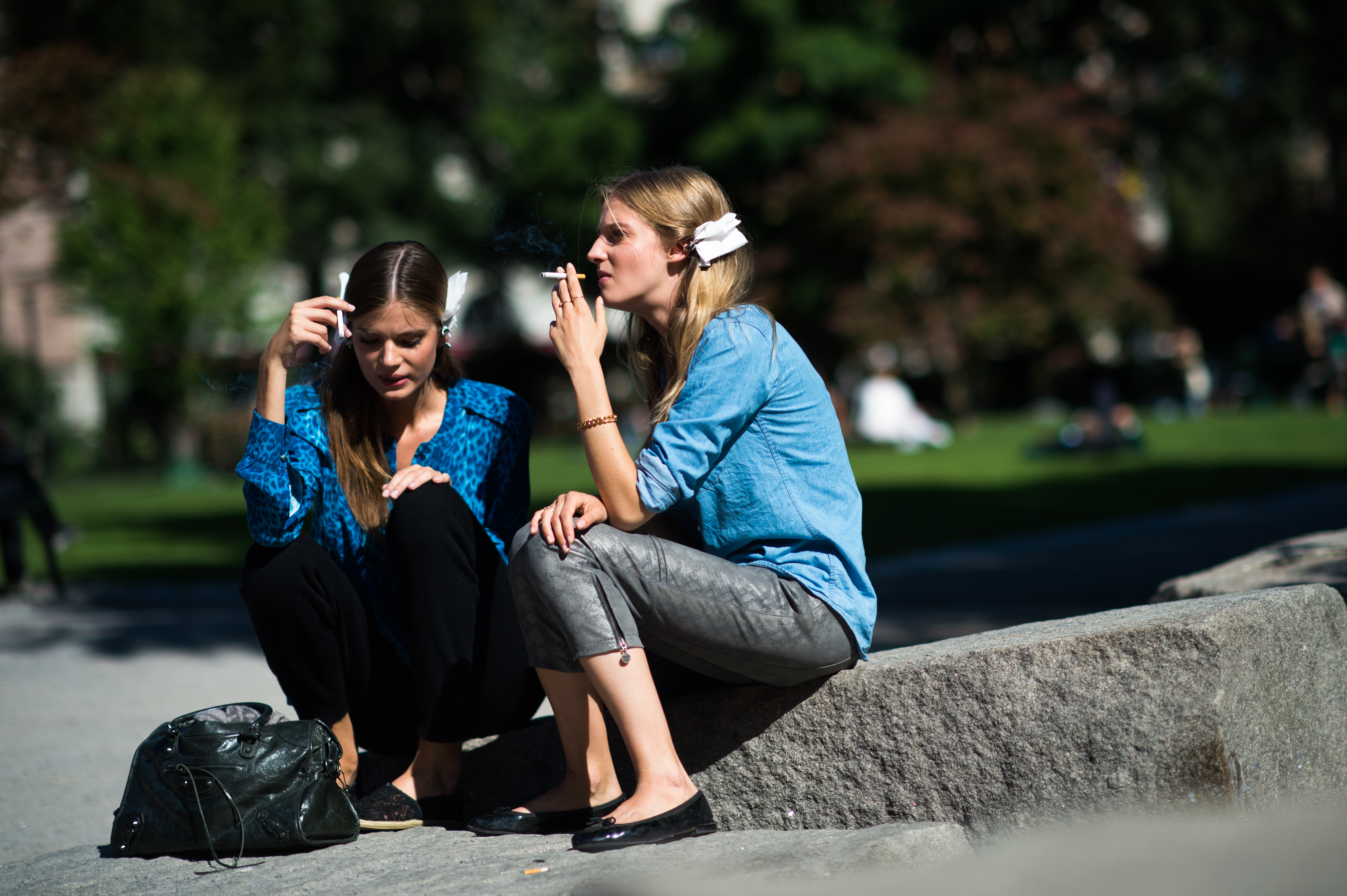 Two models smoking cigarettes in Sweden