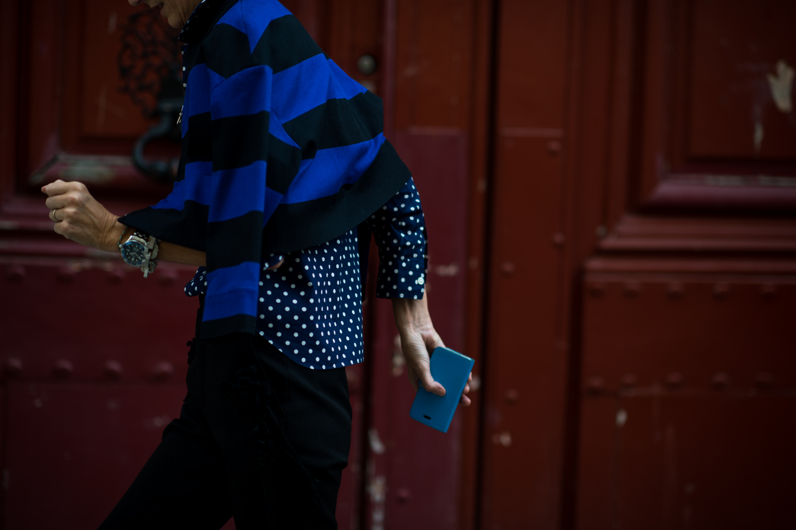 British woman wearing blue dots and stripes
