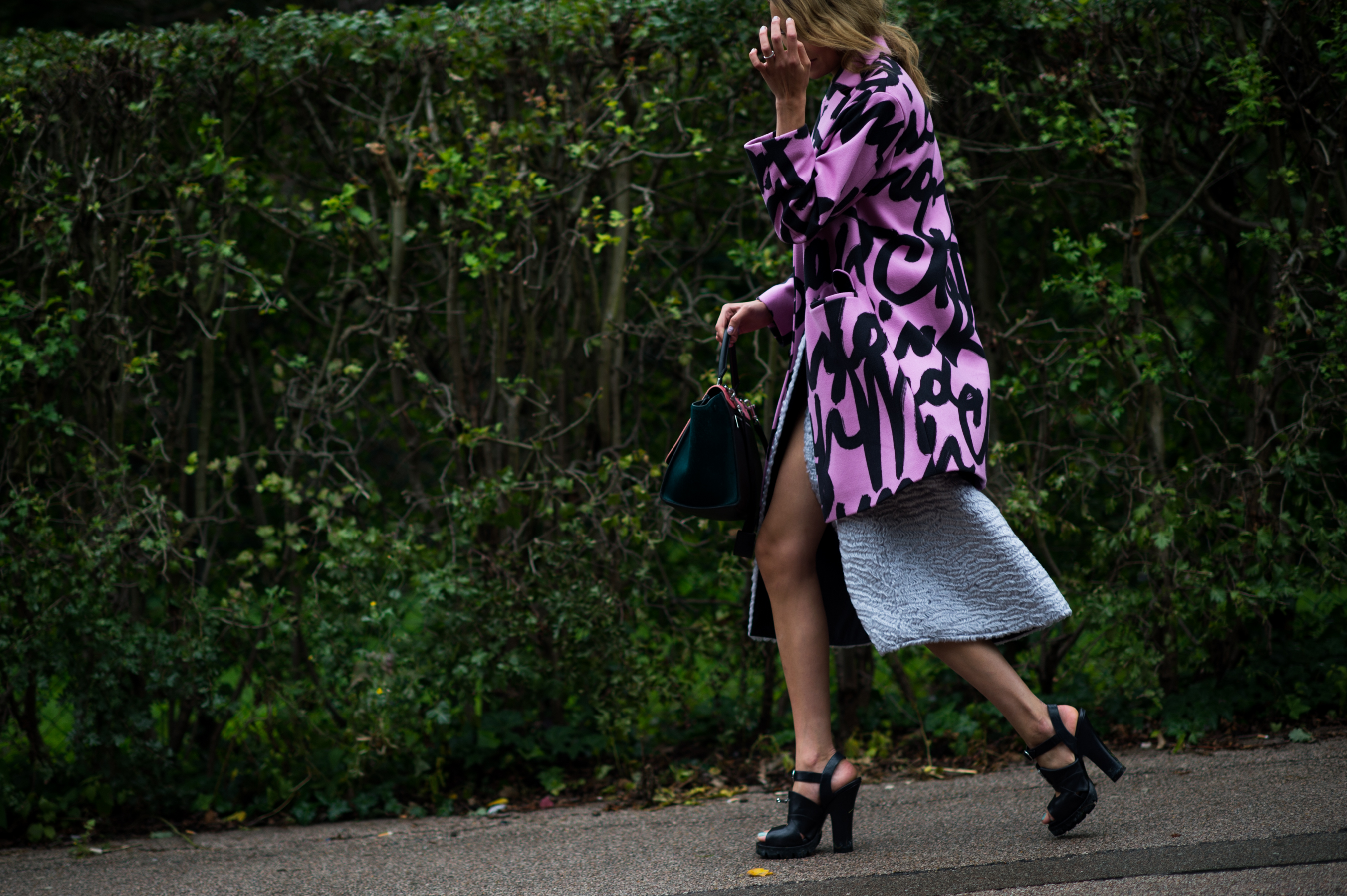 Belgian woman wearing pink coat