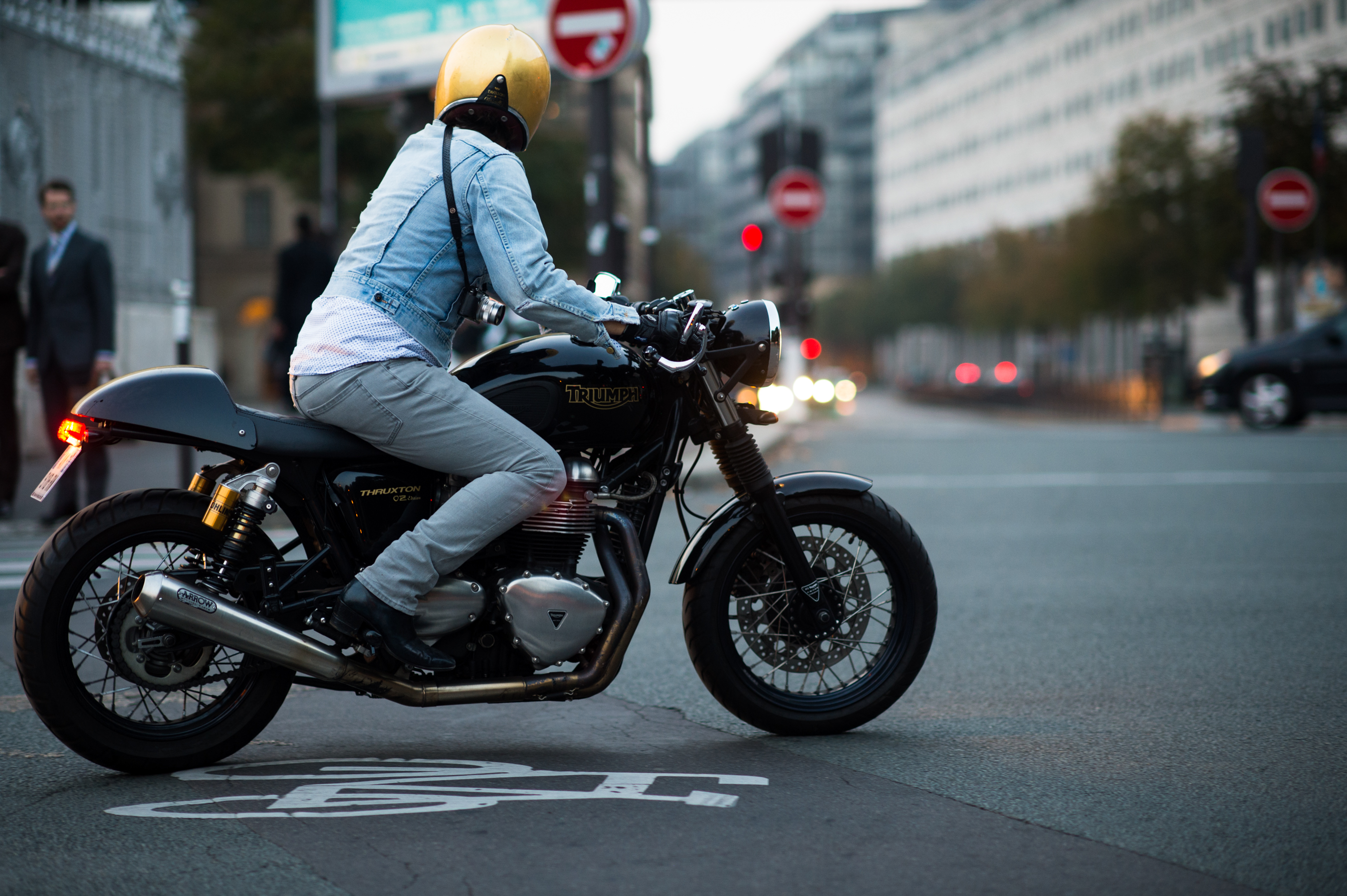 Purple Magazine editor riding motorcycle