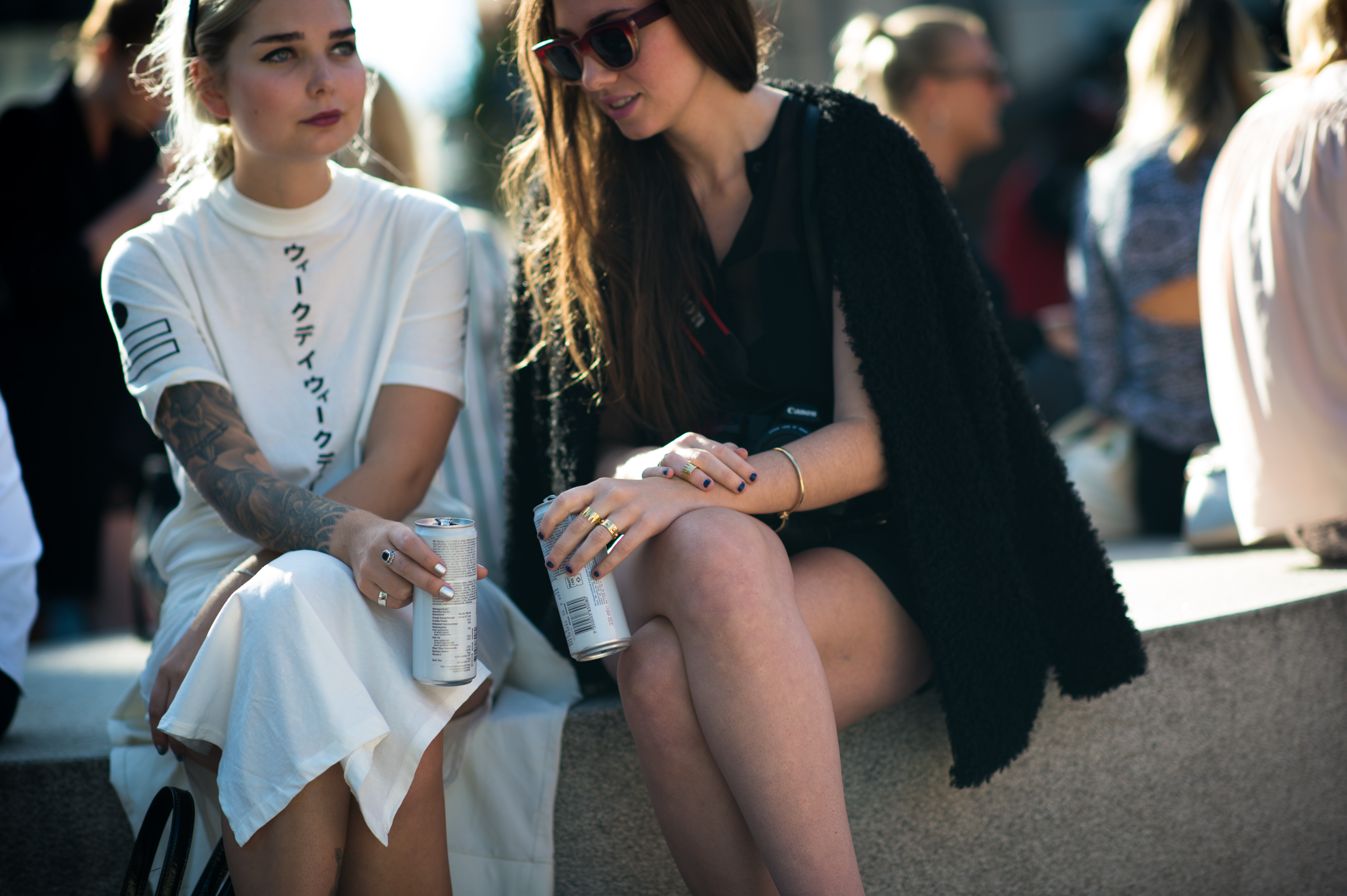 Two girls drinking soda in Sweden