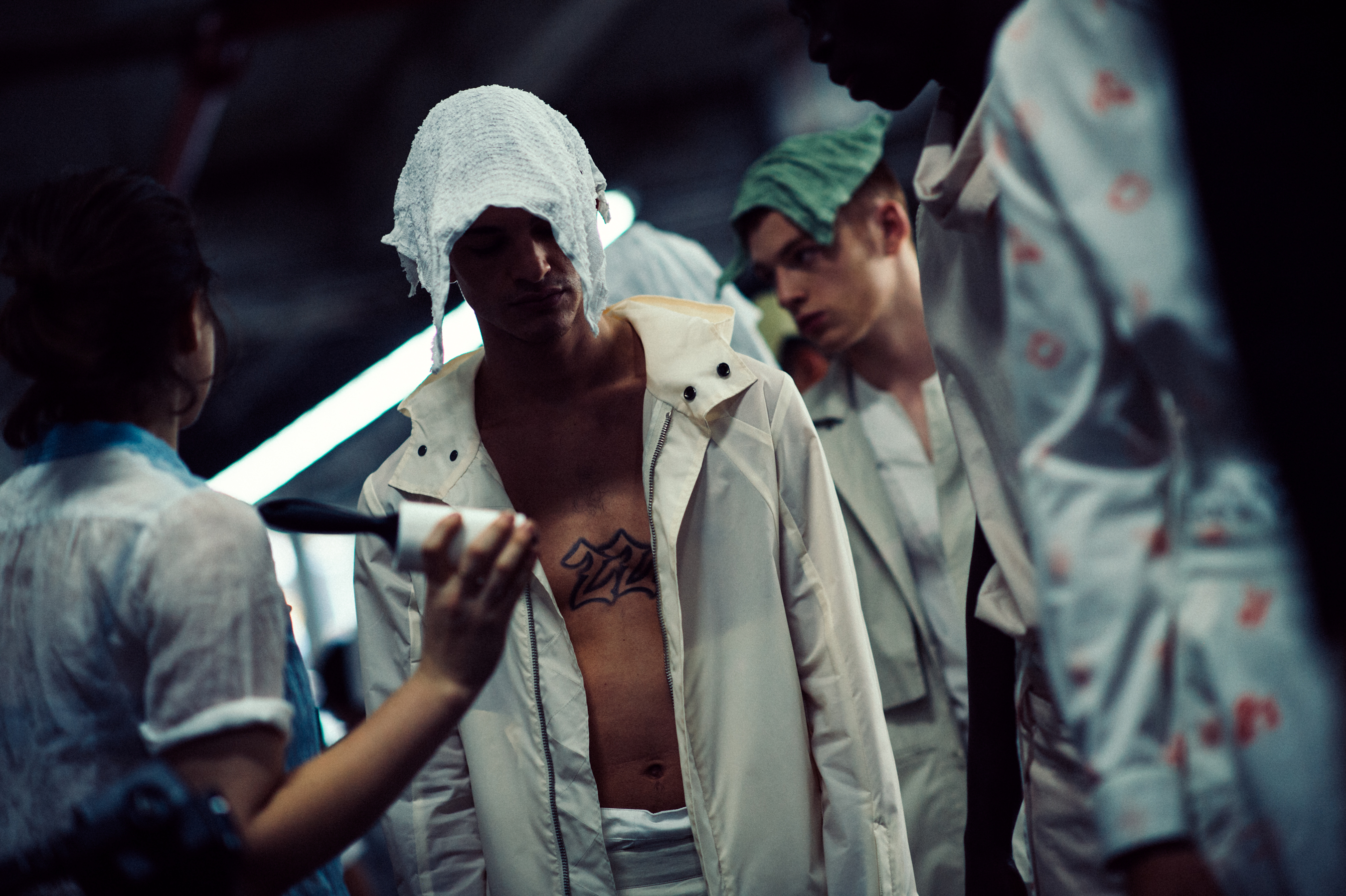 Male model with towel on his head