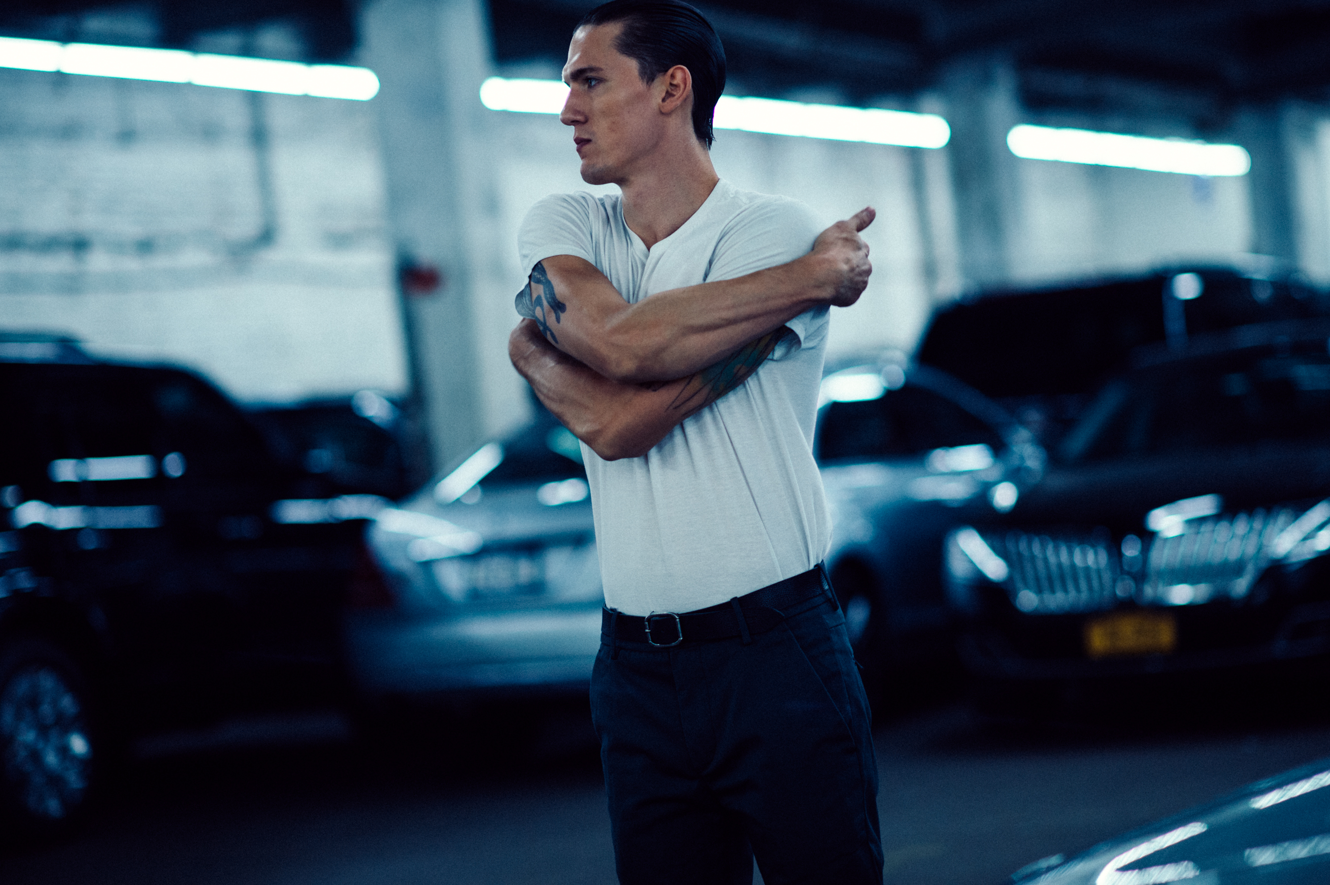 Male model Tyler Riggs stretching