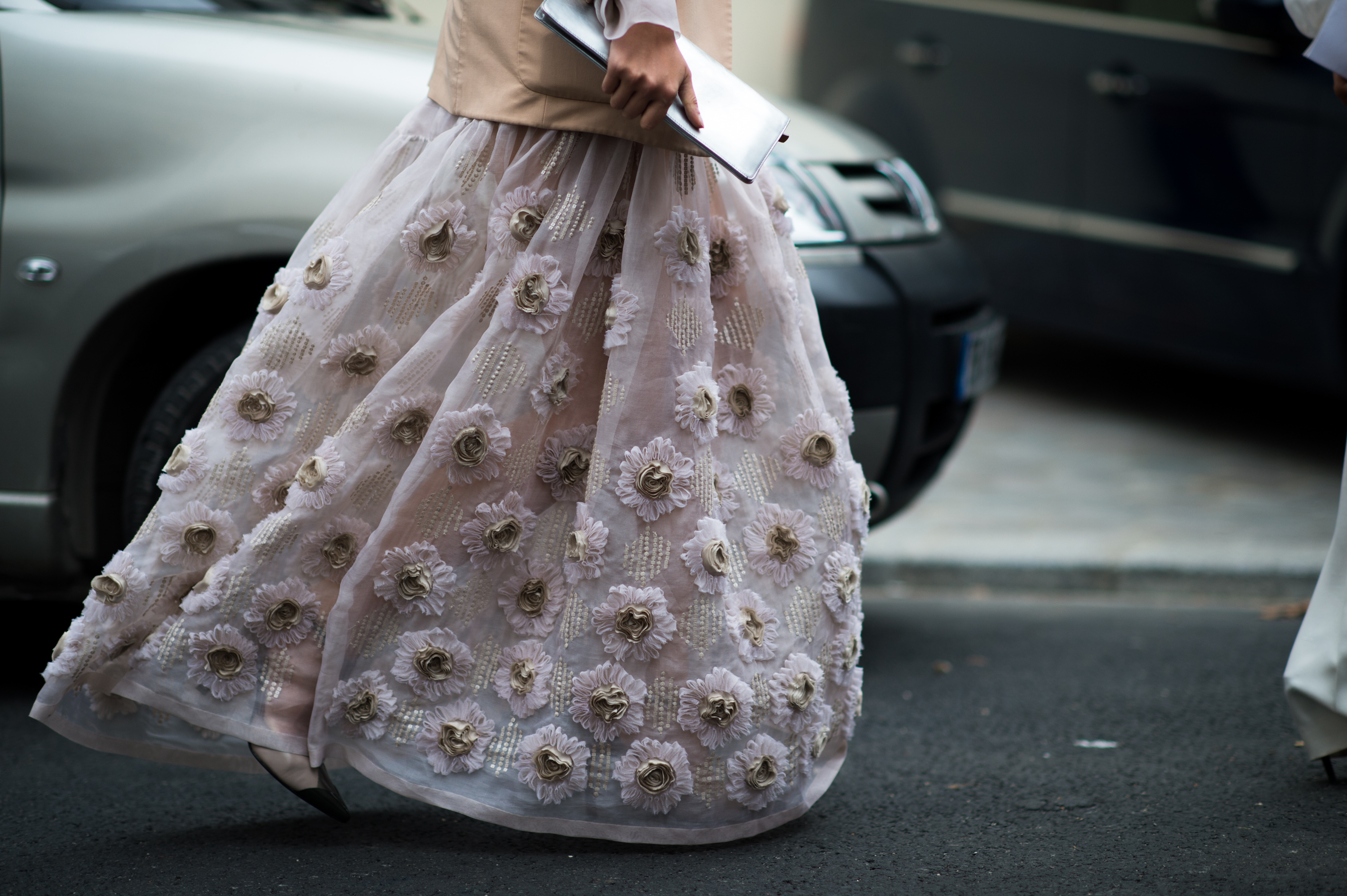 woman wearing florel embroidered skirt