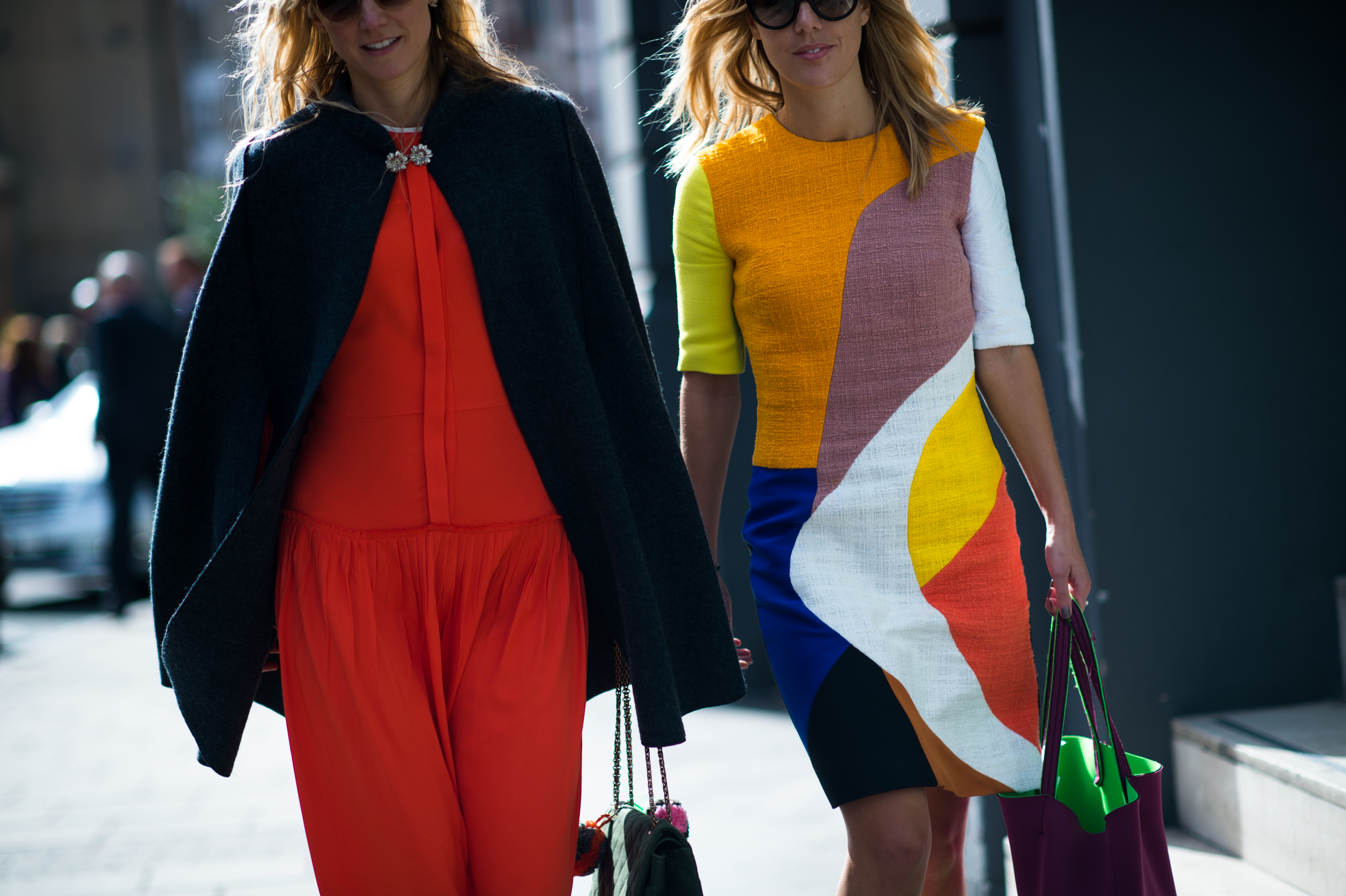 Two women wearing colour after show