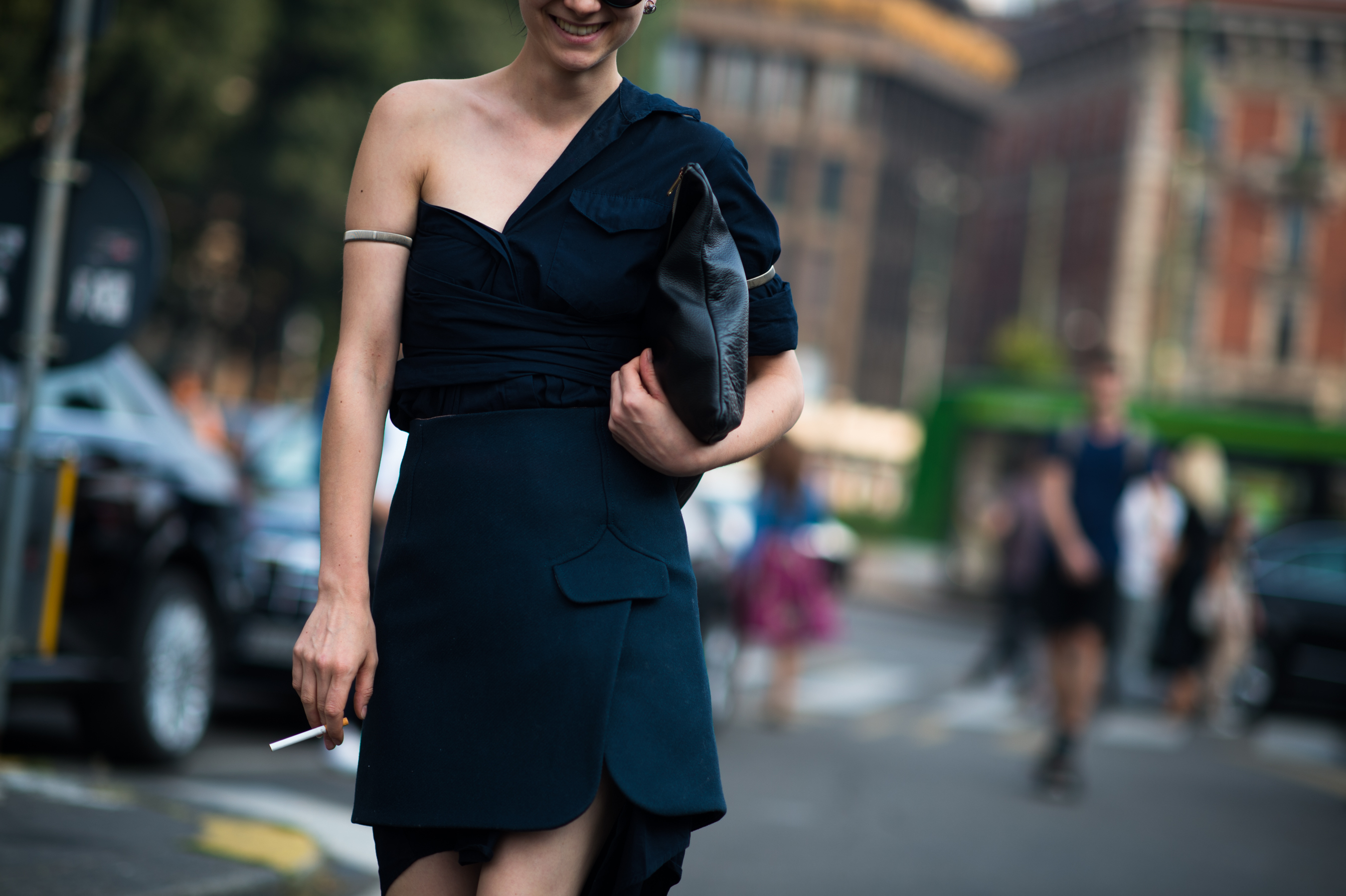 Woman wearing asymmetric dress in Italy