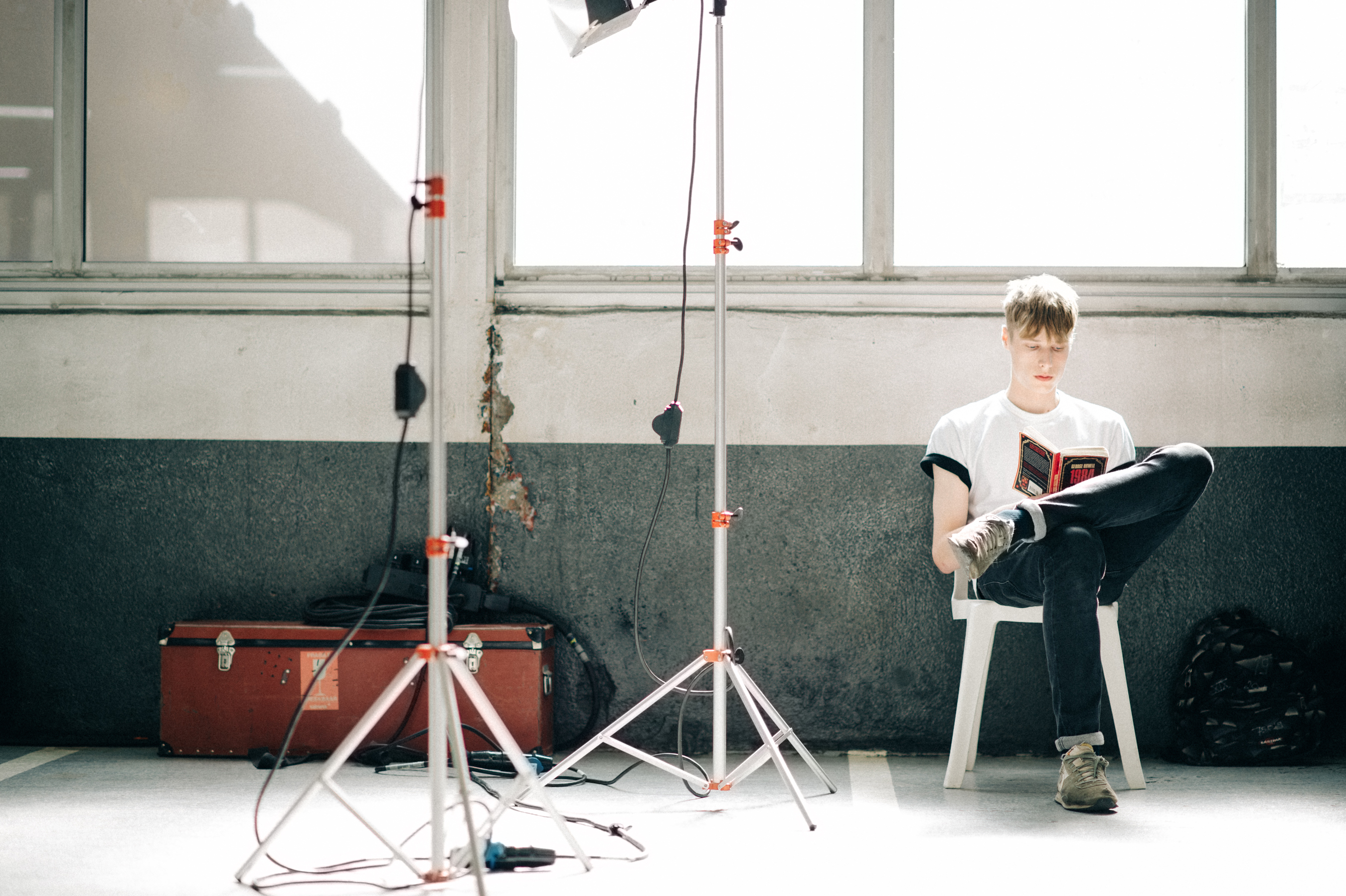 Male model Freddie Stoker reading
