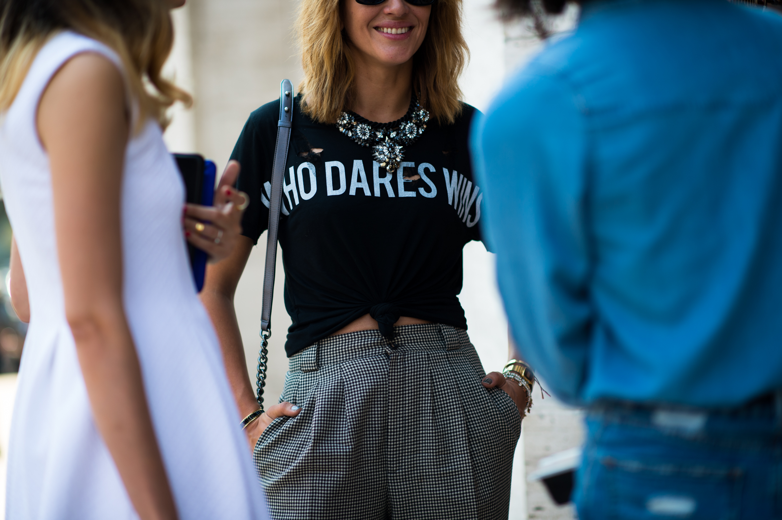 Belgian woman wearing Who Dares Wins shirt