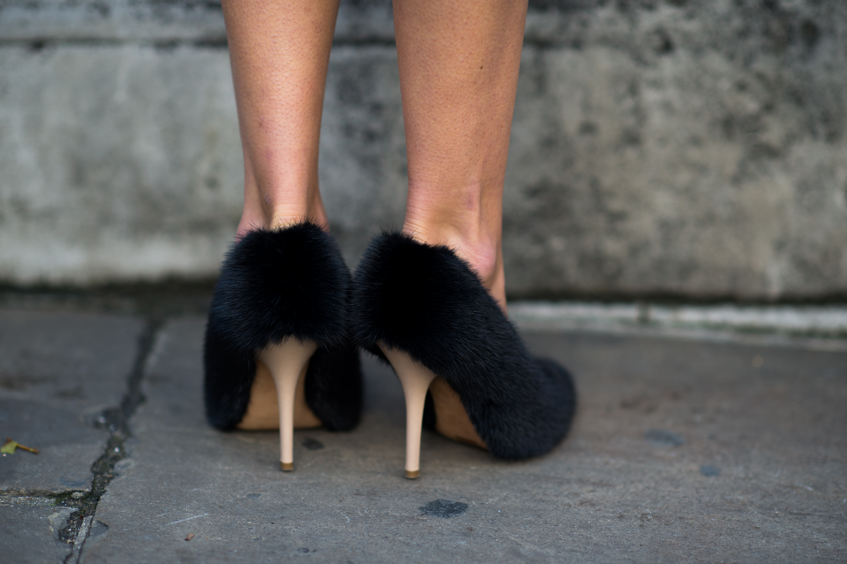 Girl wearing Céline fur heels