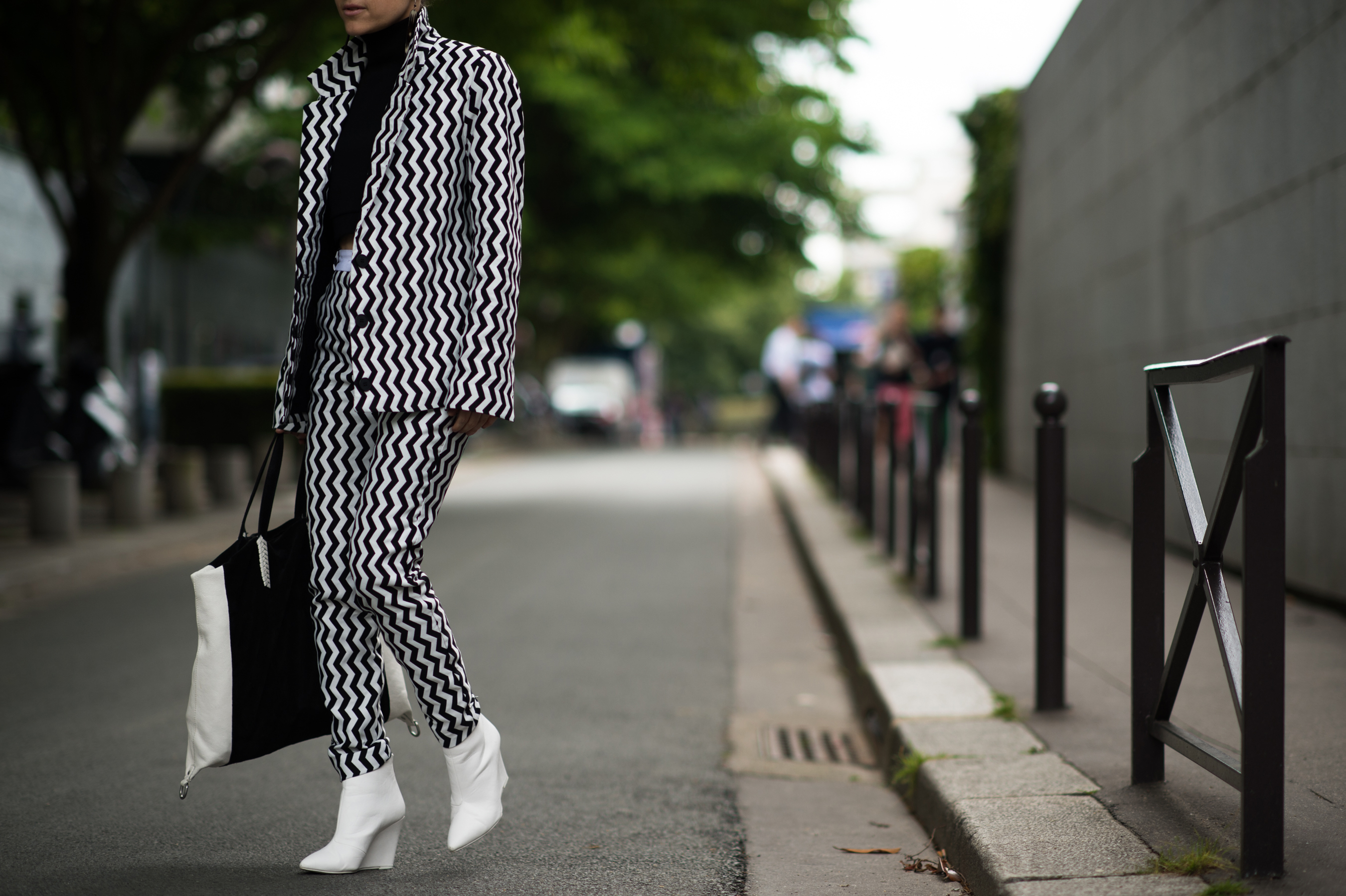 American woman wearing black and white