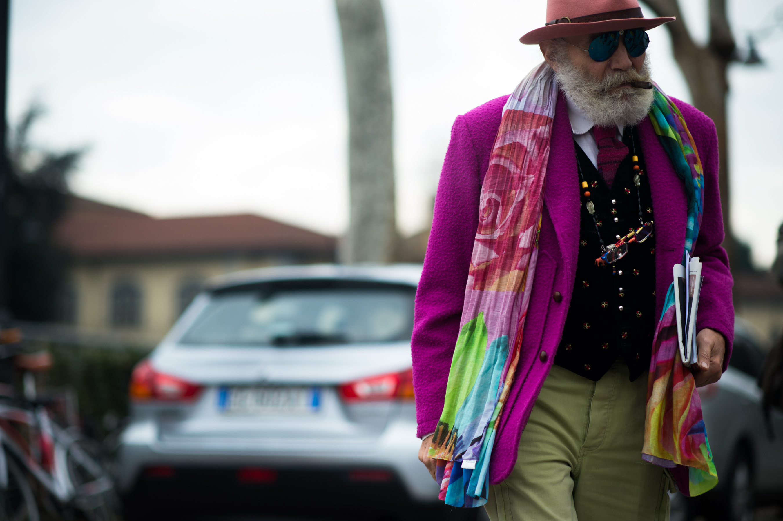 Italian man wearing pink fleece jacket
