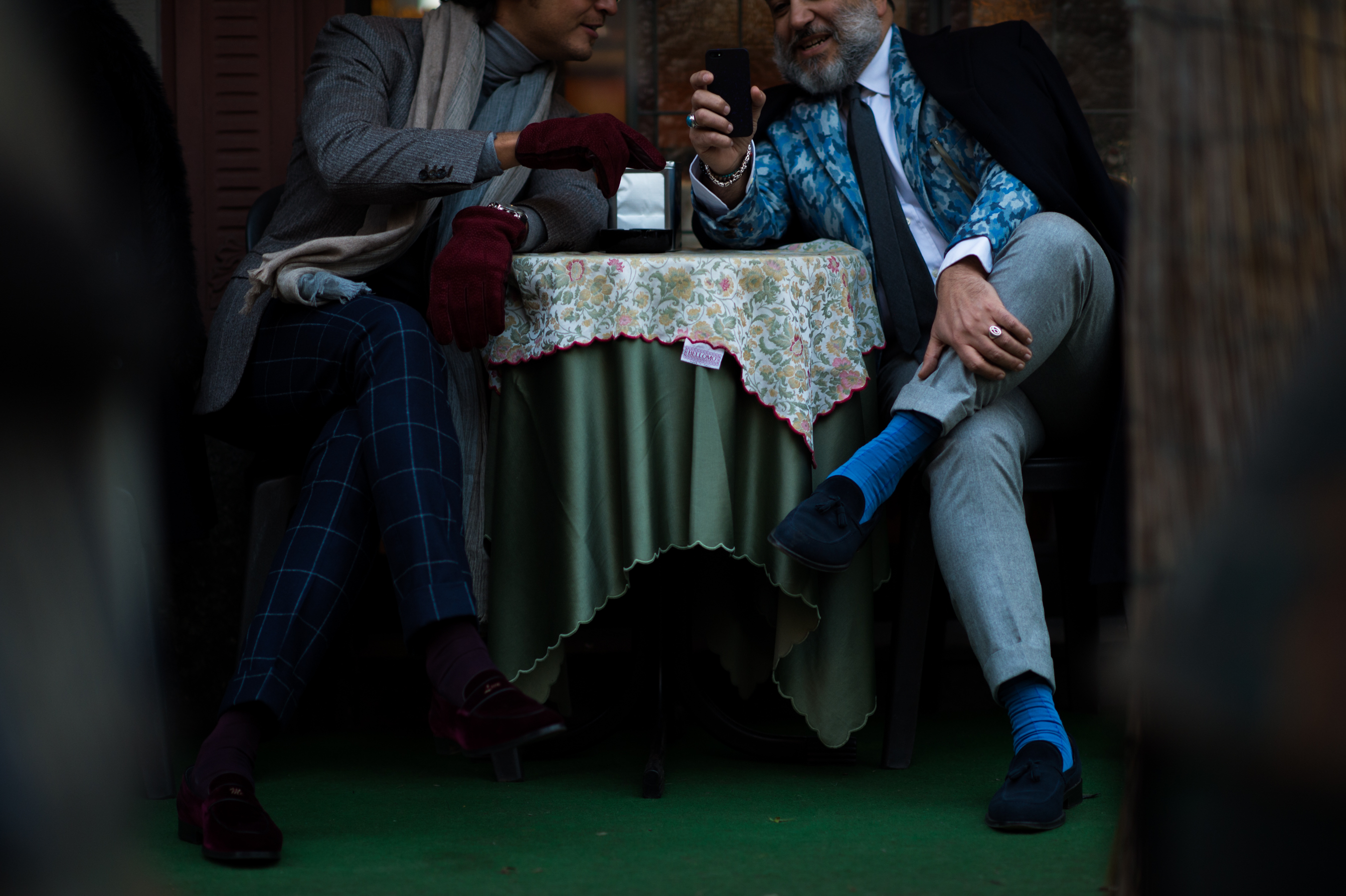 Two men sitting at a café