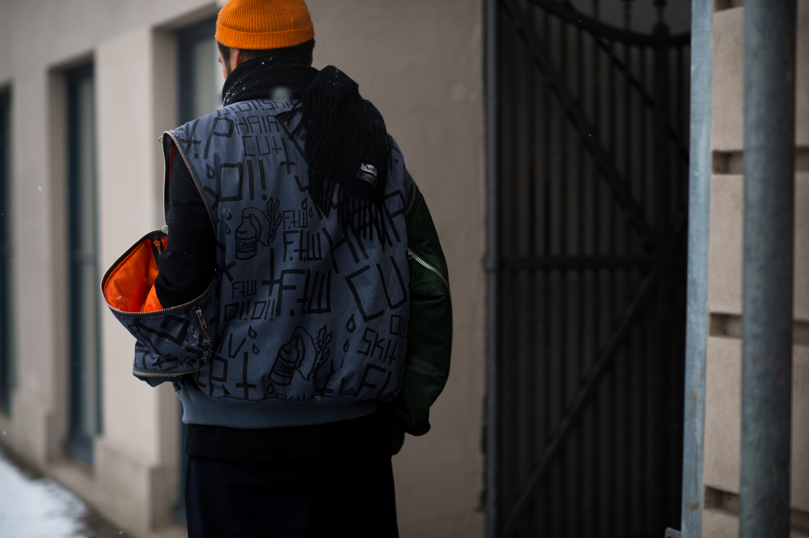 Norwegian designer wearing graffiti print jacket