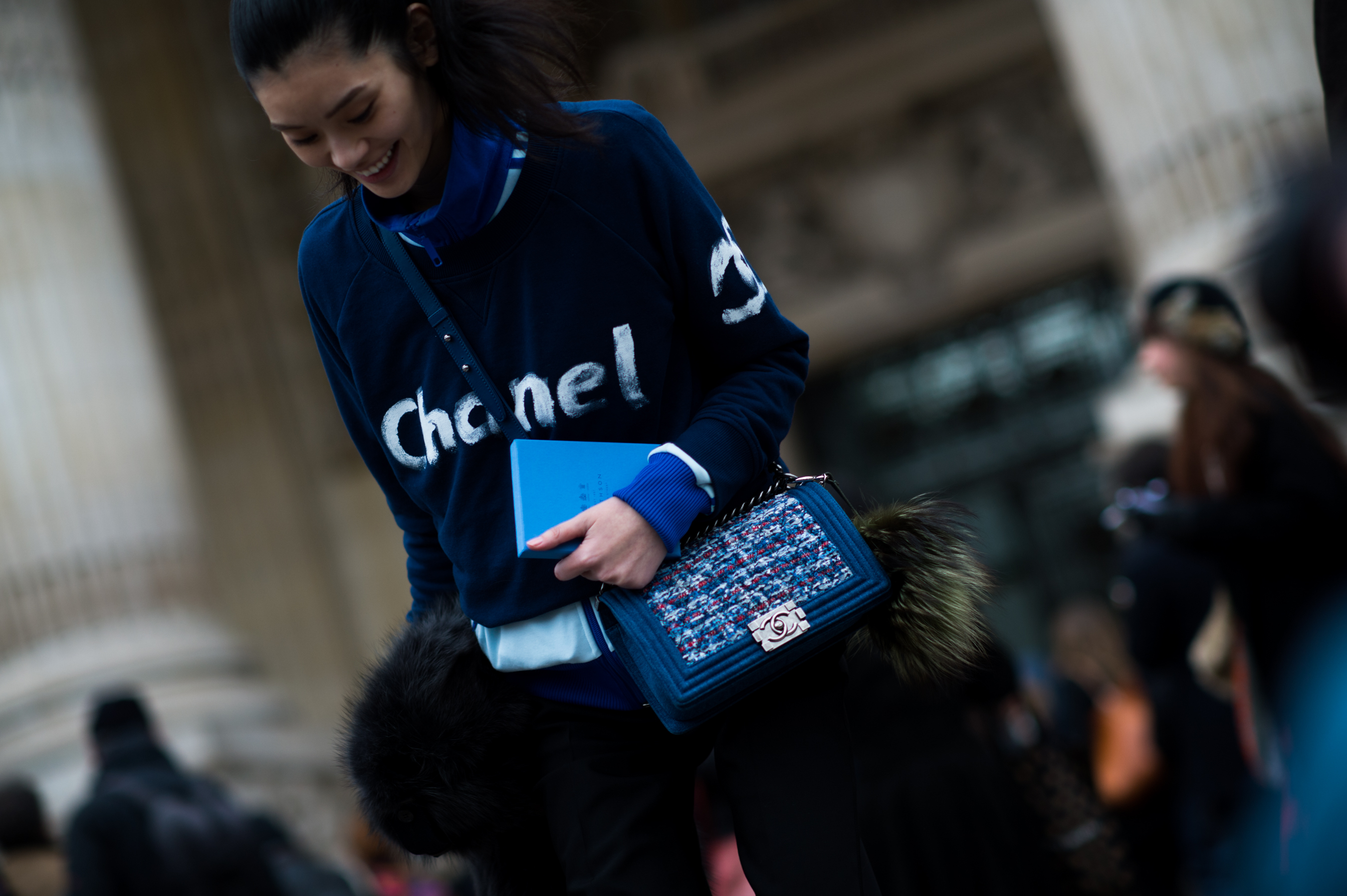 Chinese model wearing Chanel and Fendi
