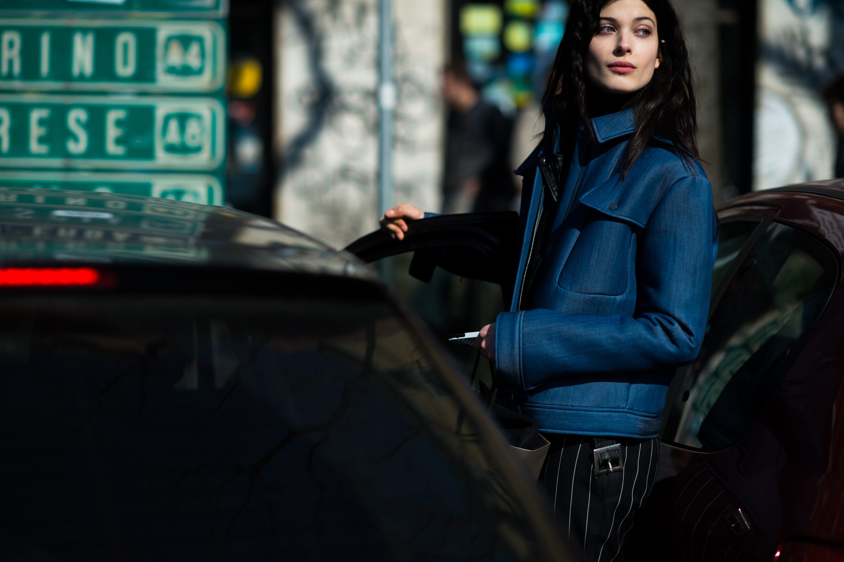 German model wearing blue neoprene jacket