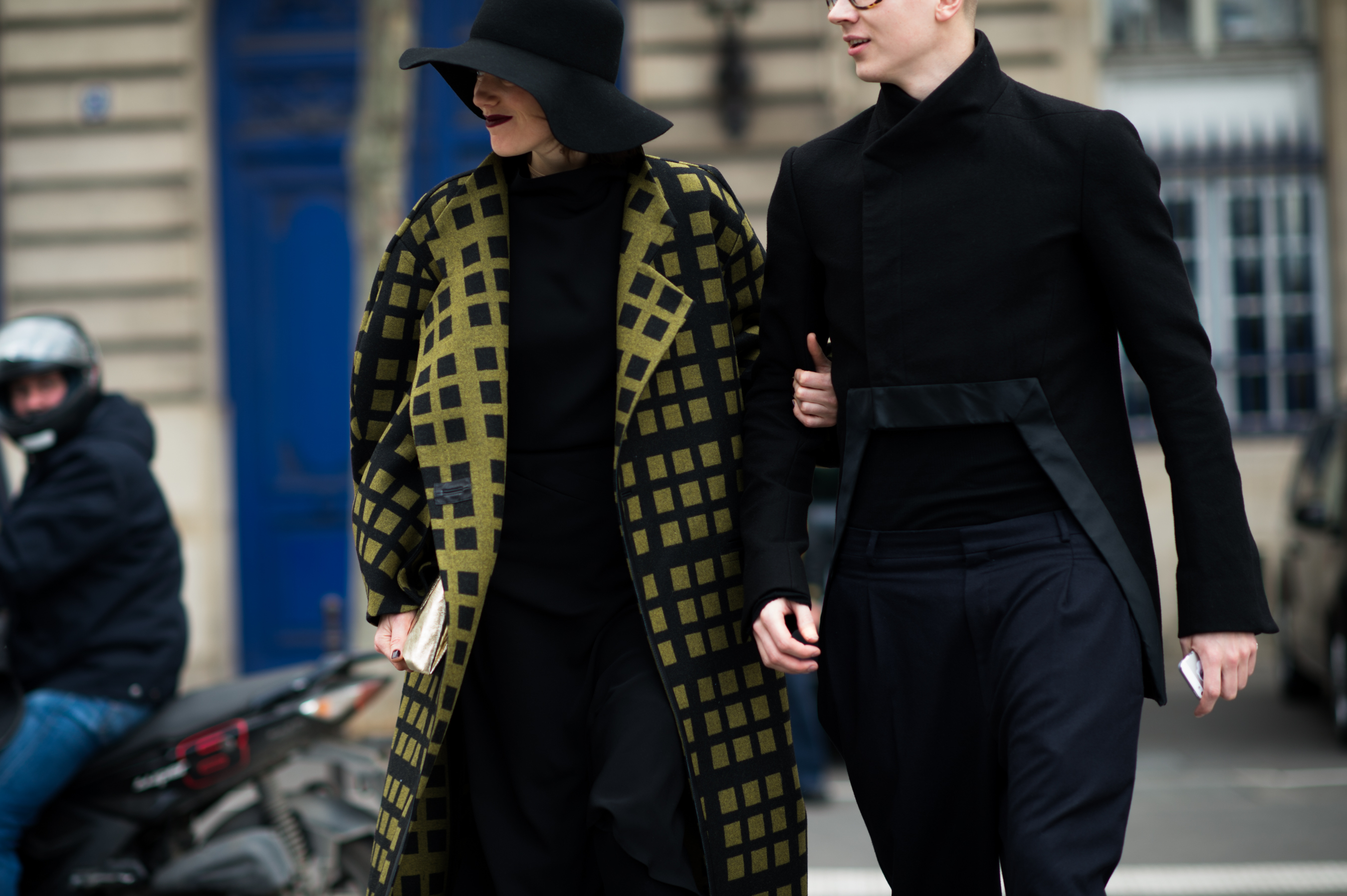 Man and woman walking to a fashion show