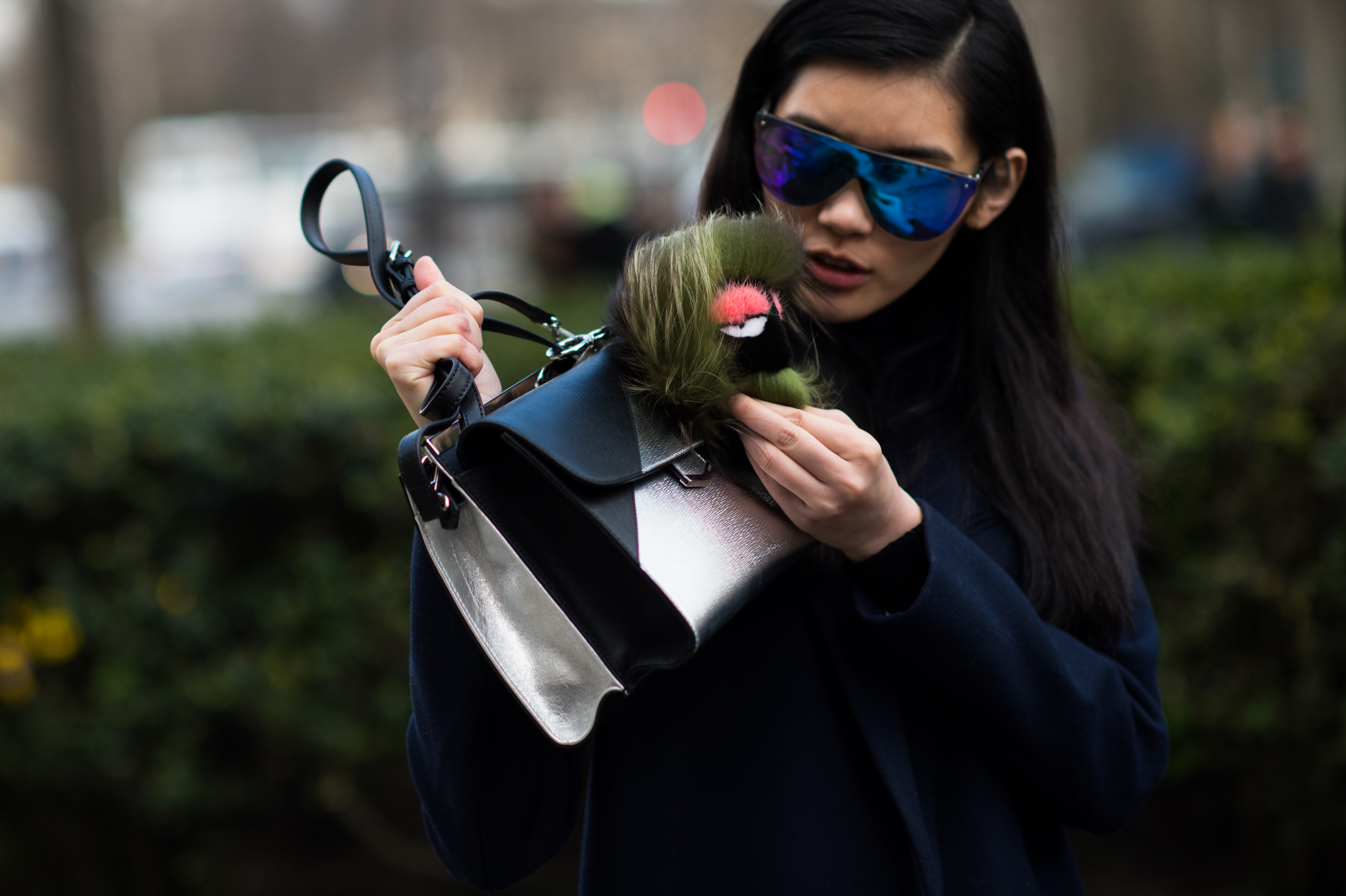 Chinese model in sunglasses with Fendi pet