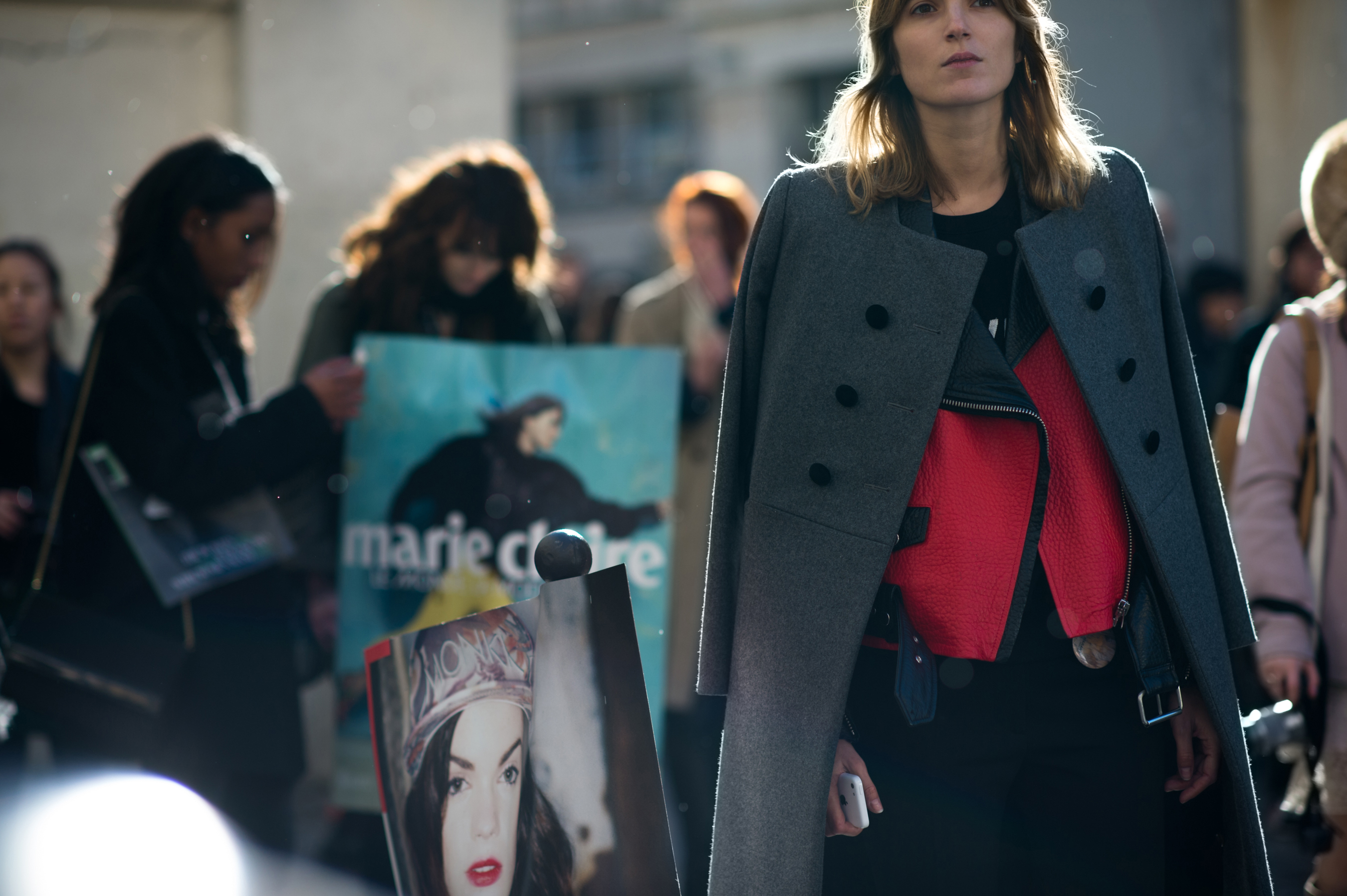 French woman wearing red leather vest