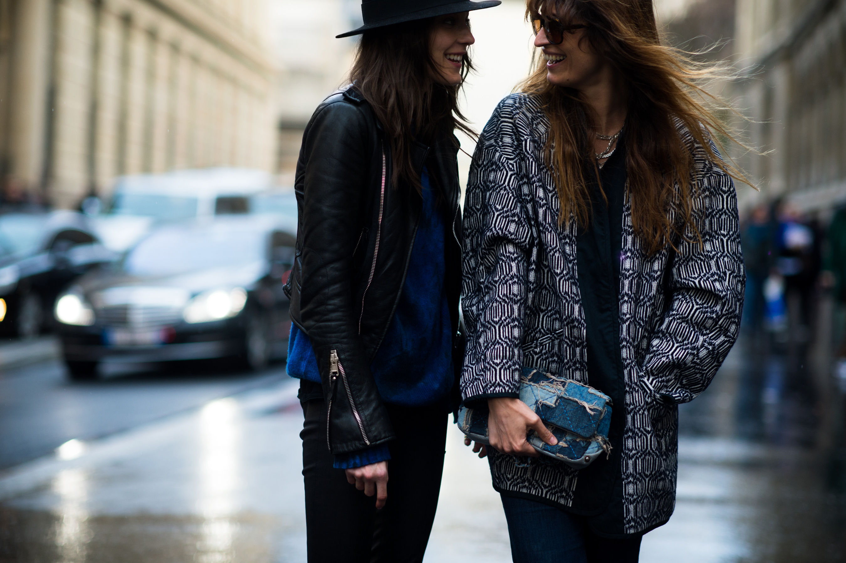 French woman and German model laughing