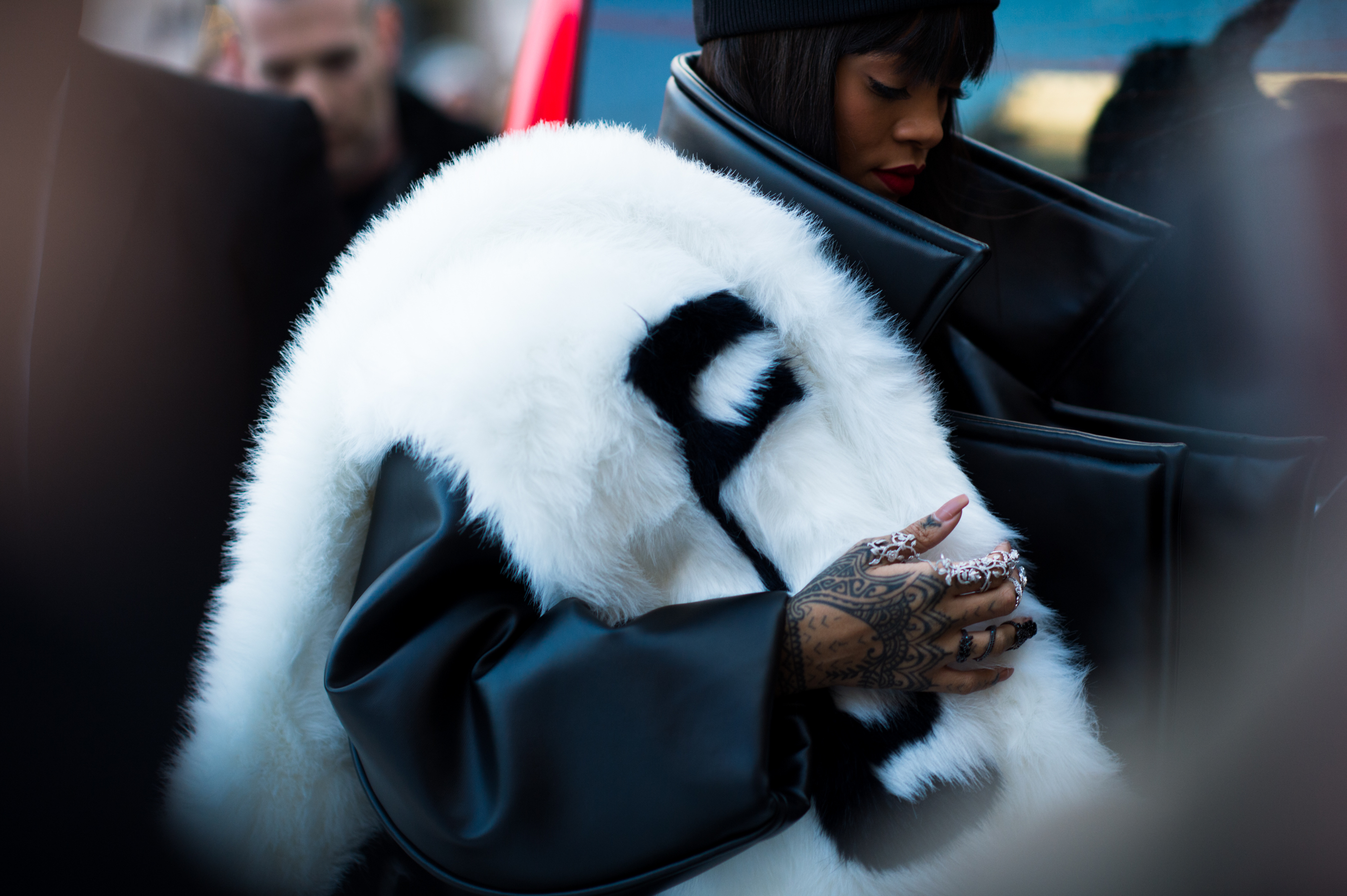 American singer wearing white fur