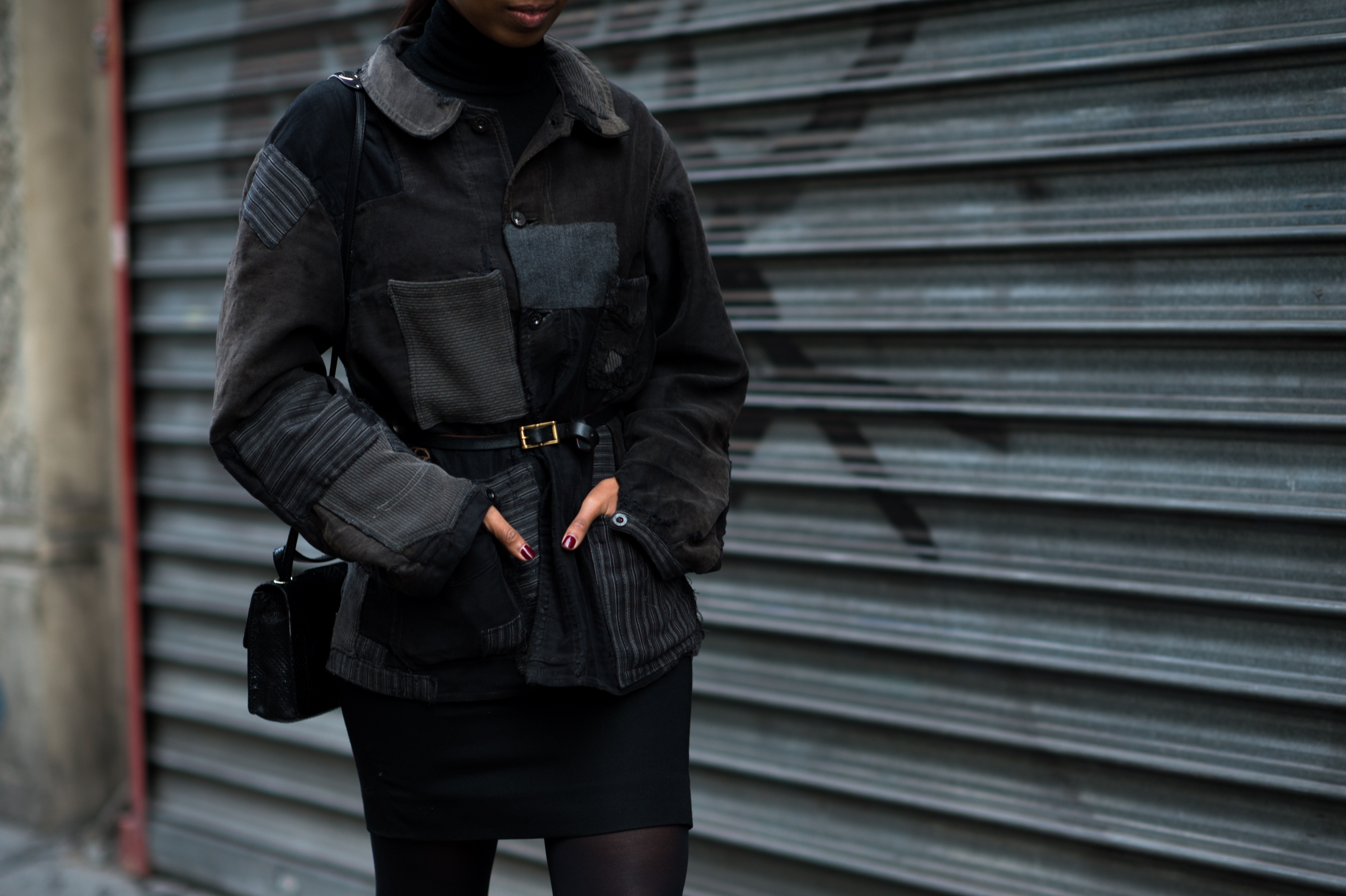 Woman wearing patchwork jacket in France