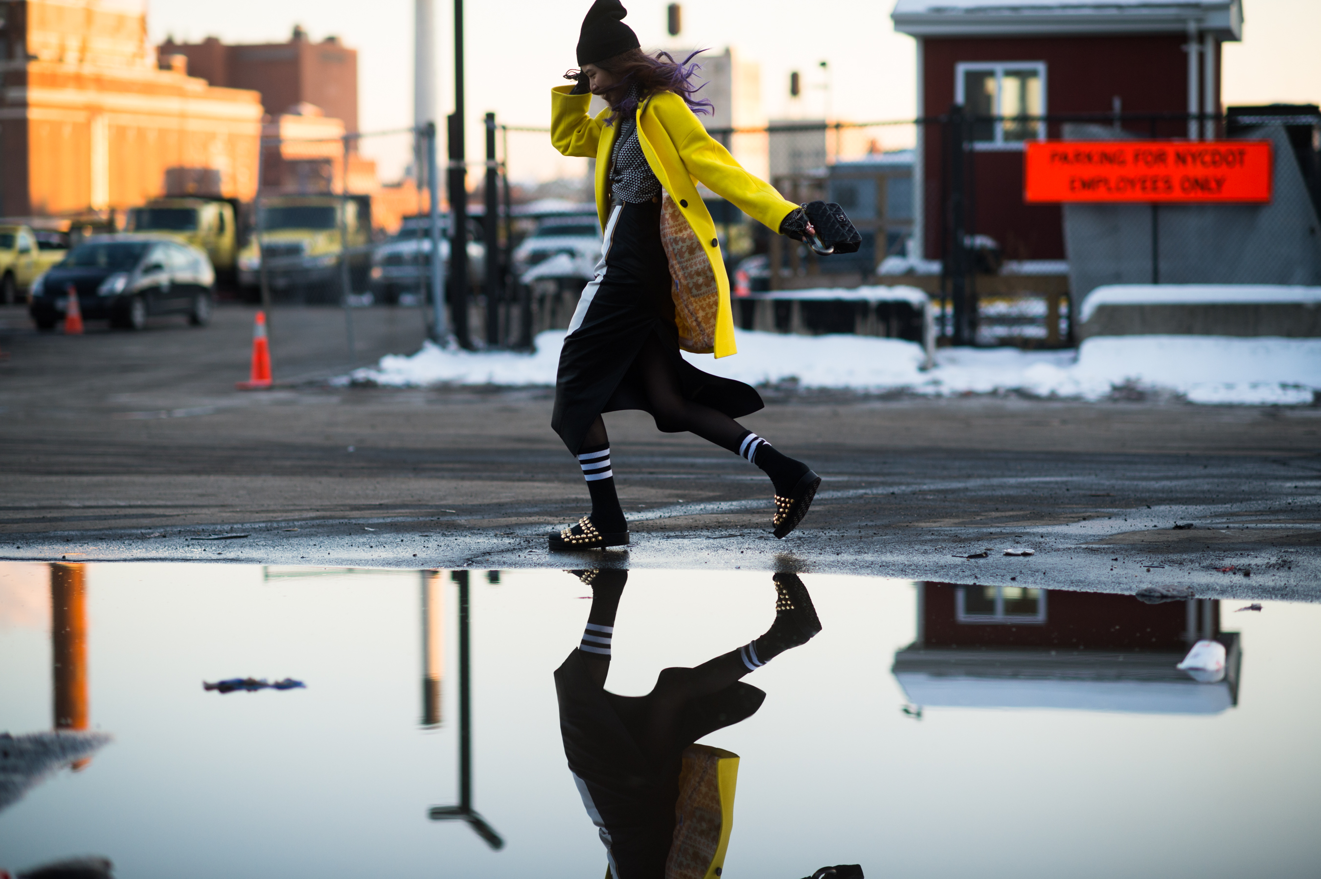 South Korean model wearing yellow coat