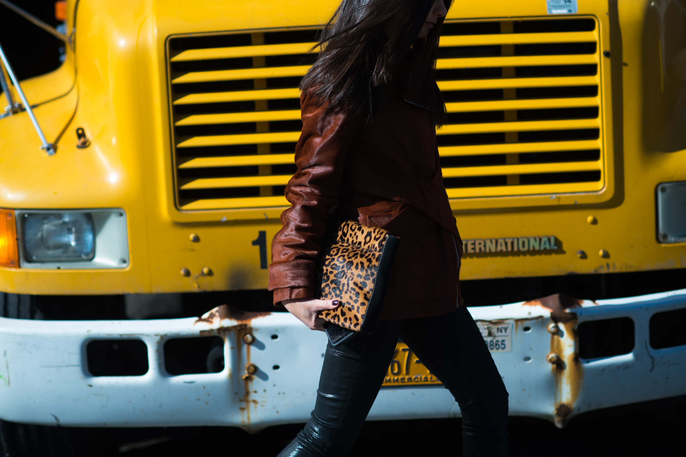Girl wearing pony hair jacket in NYC