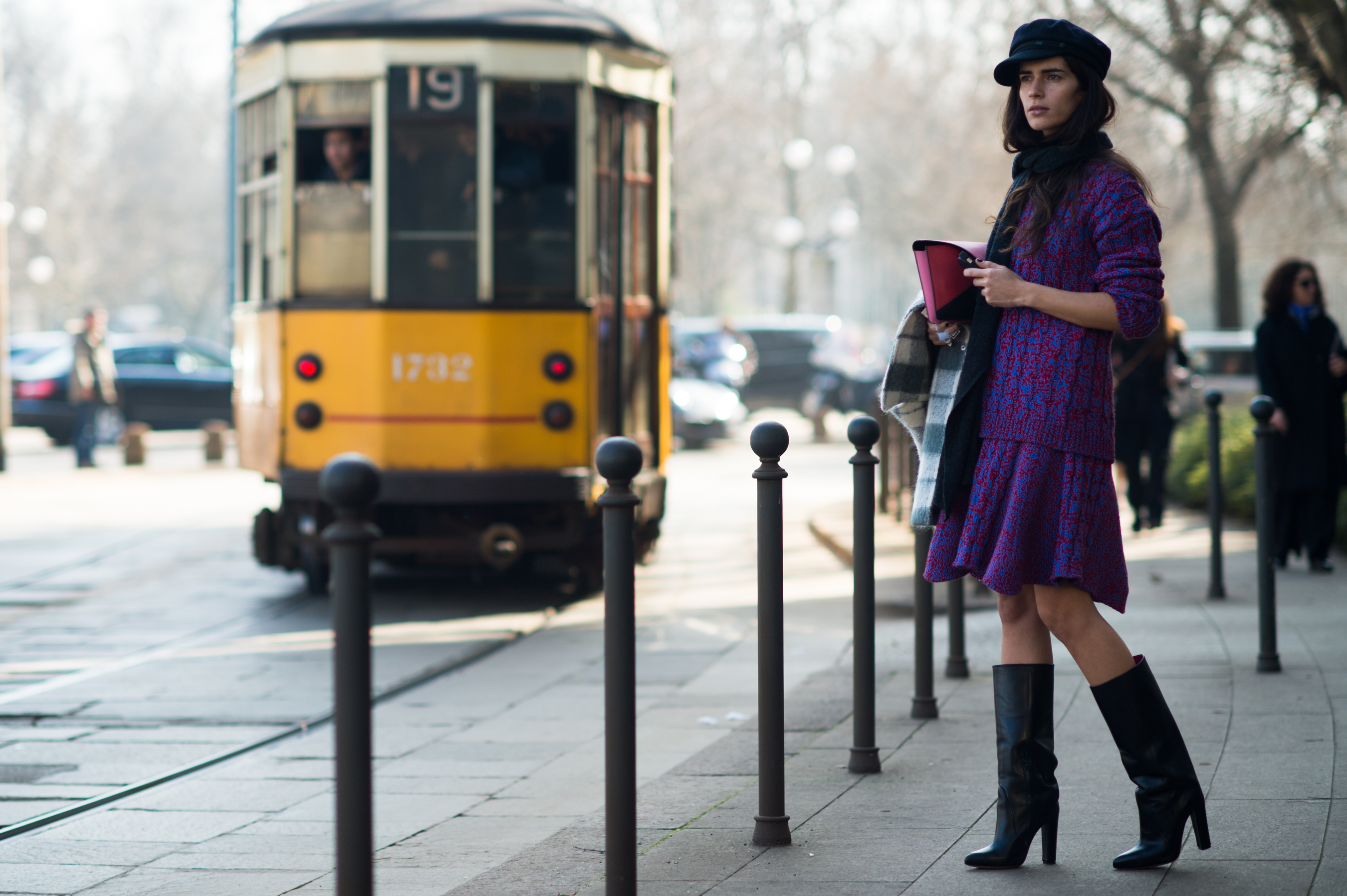 Italian girl with Milanese streetcar in the background