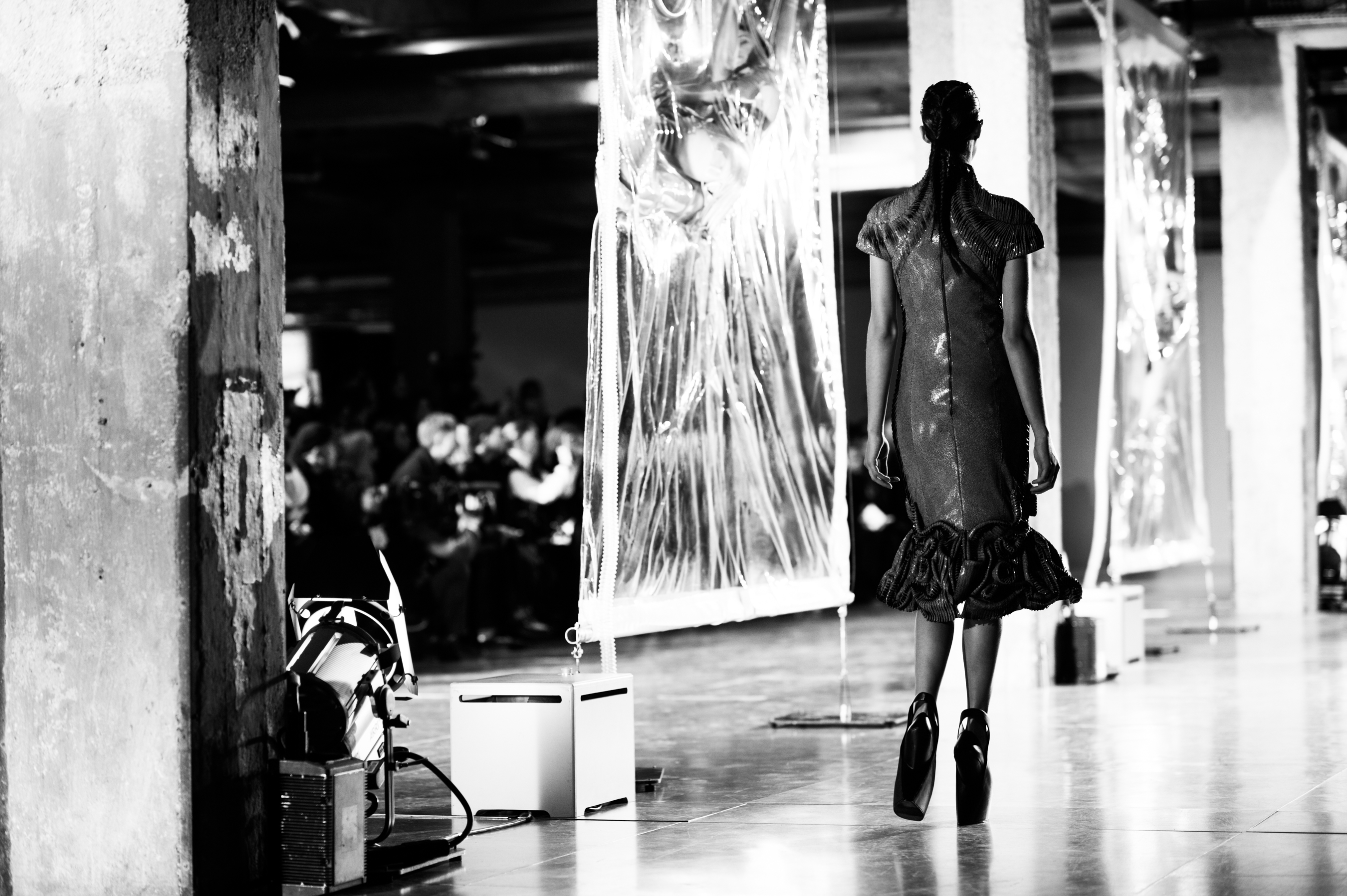 Model walking fashion show runway