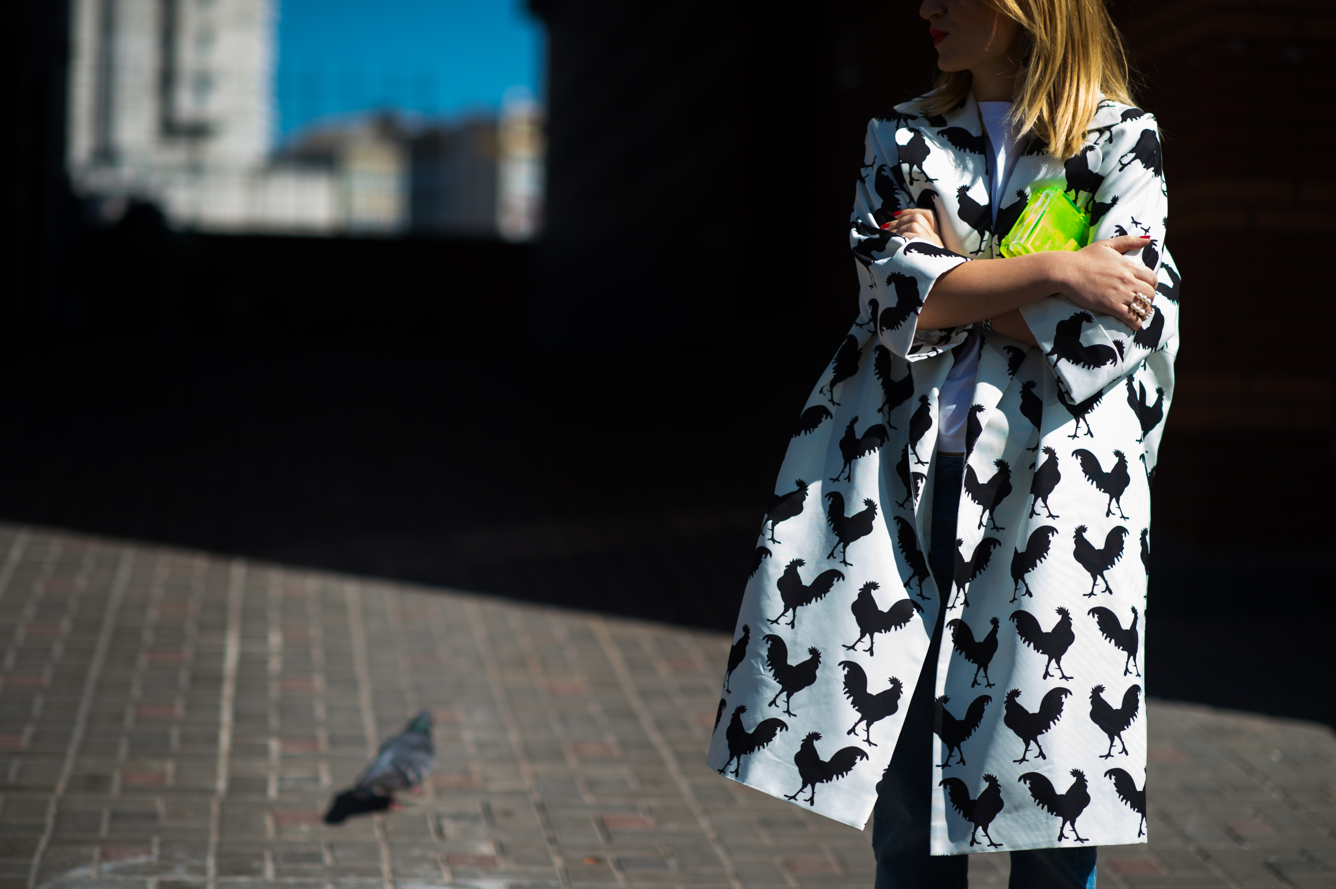 Ukrainian woman wearing A.W.A.K.E. rooster coat