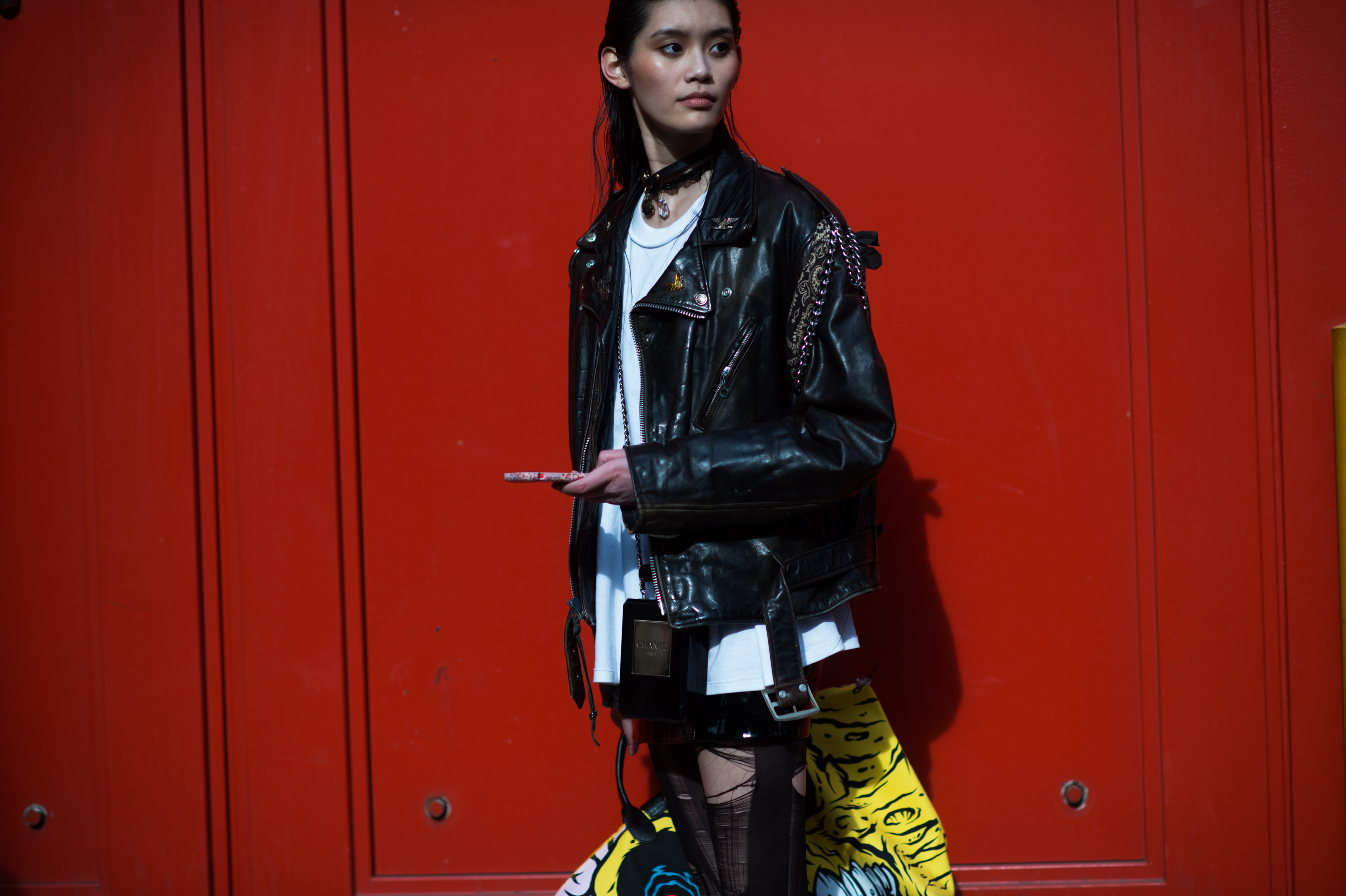 Chinese model wearing black leather jacket
